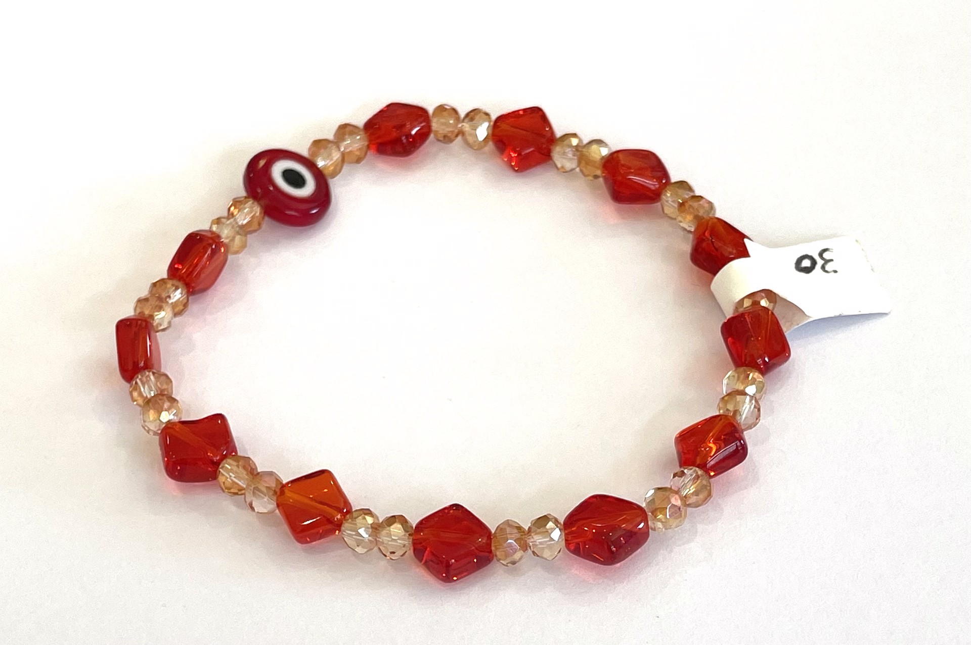 Red Glass Beads with Evil Eye by Emelie Hebert