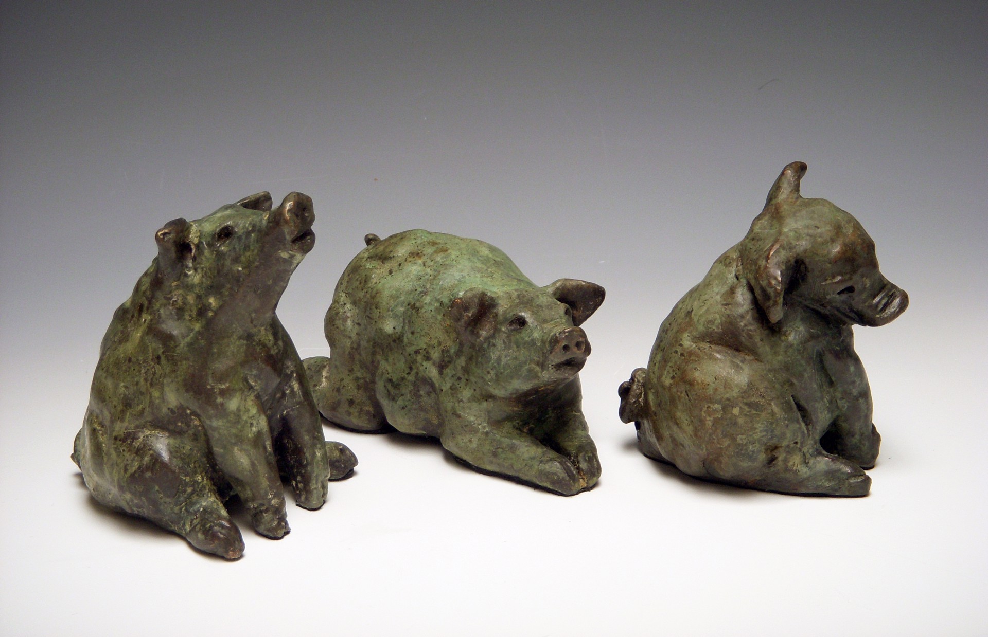 3 Moss Piggies ($625 per piece) by Kari Rives