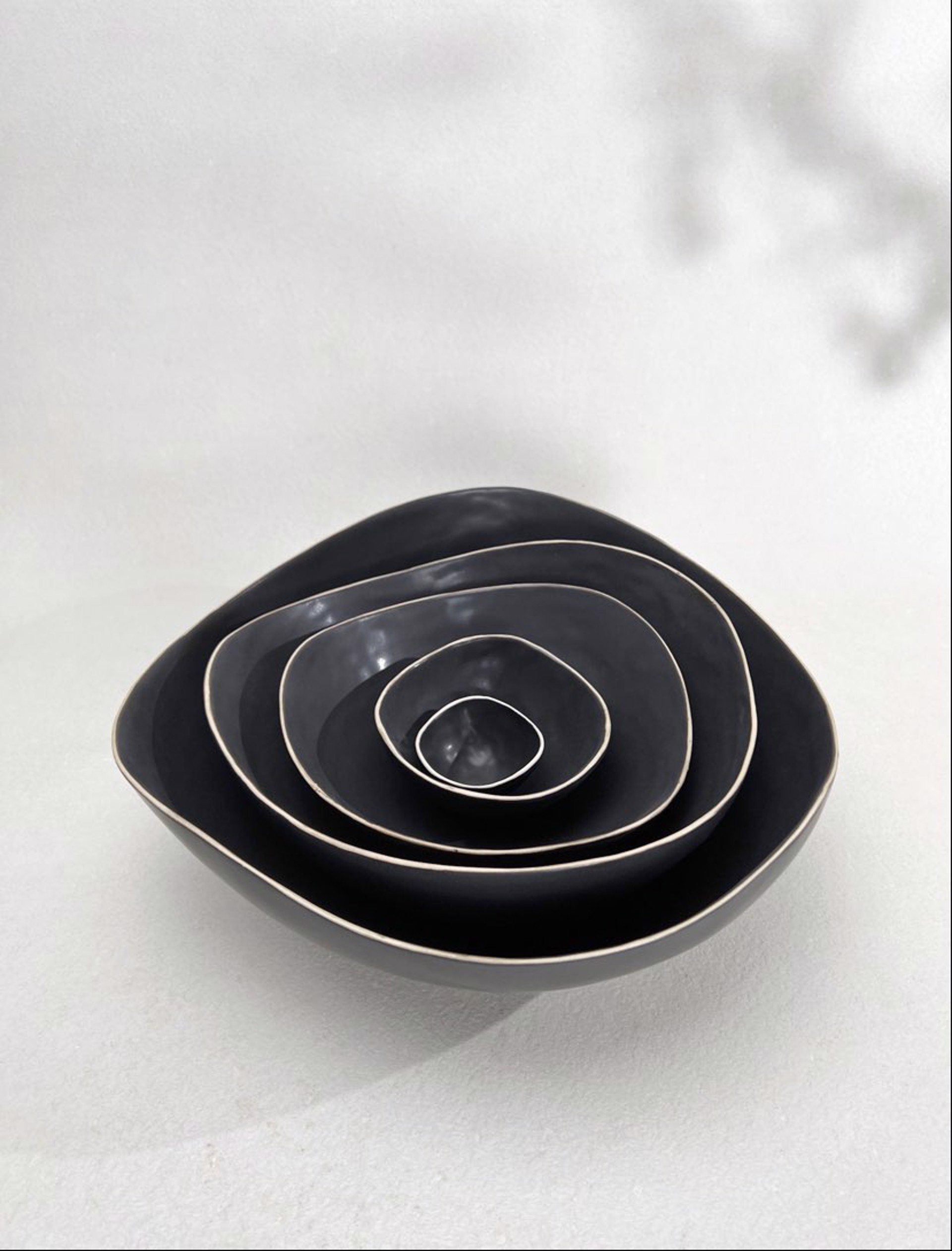 Round Black Nesting Bowls by Kate Tremel