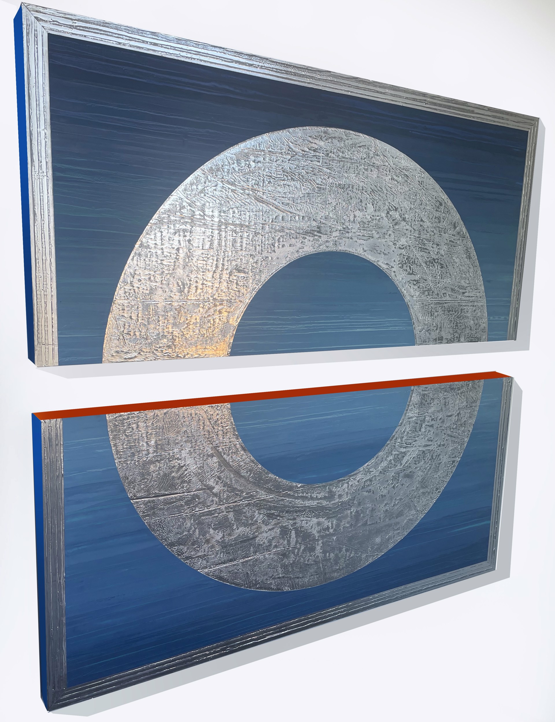 California artist and painter Stephanie Paige's 60"H x 60"W painting Wisdom is a beautiful diptych made of two wood panels with layers of blue marble plaster paint, a silver outline and a silver leafed circle.