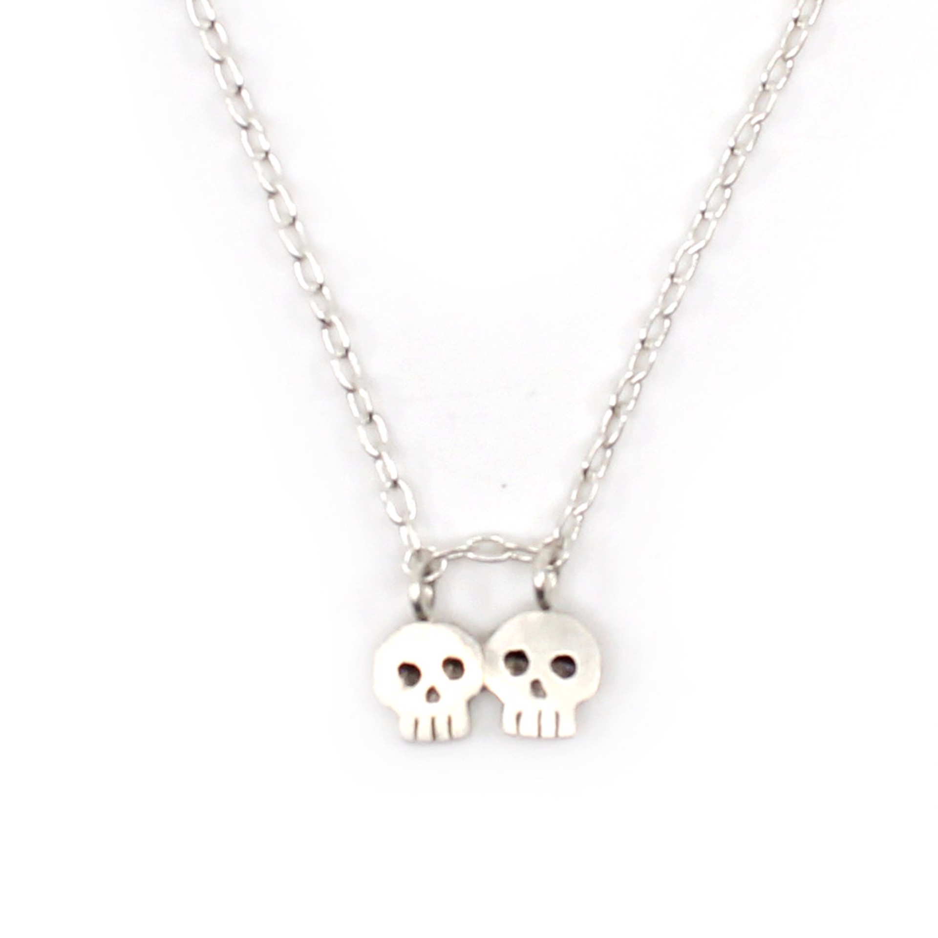 Skull Buddies Necklace by Susan Elnora