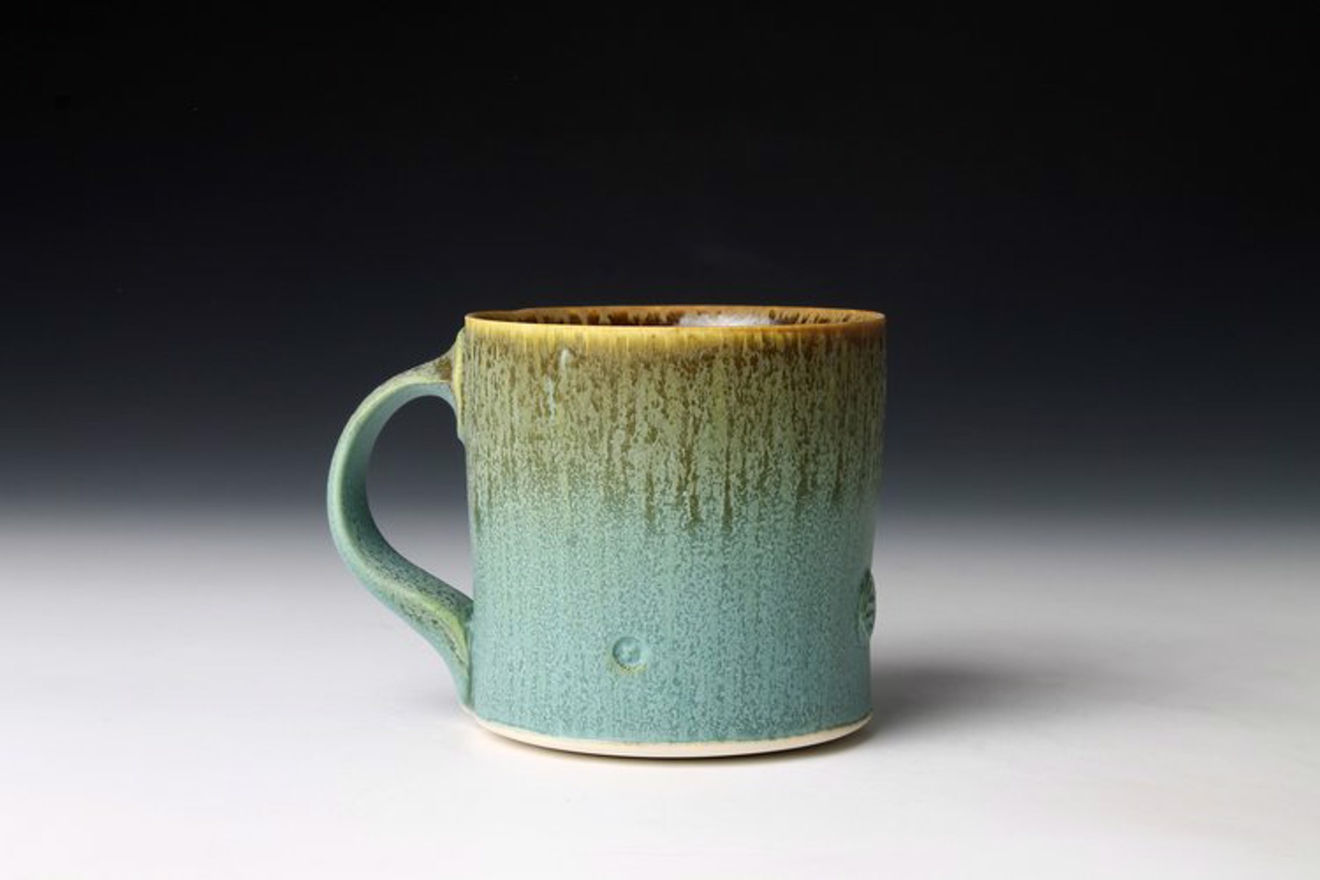 Round Turquoise Mug by Nick DeVries