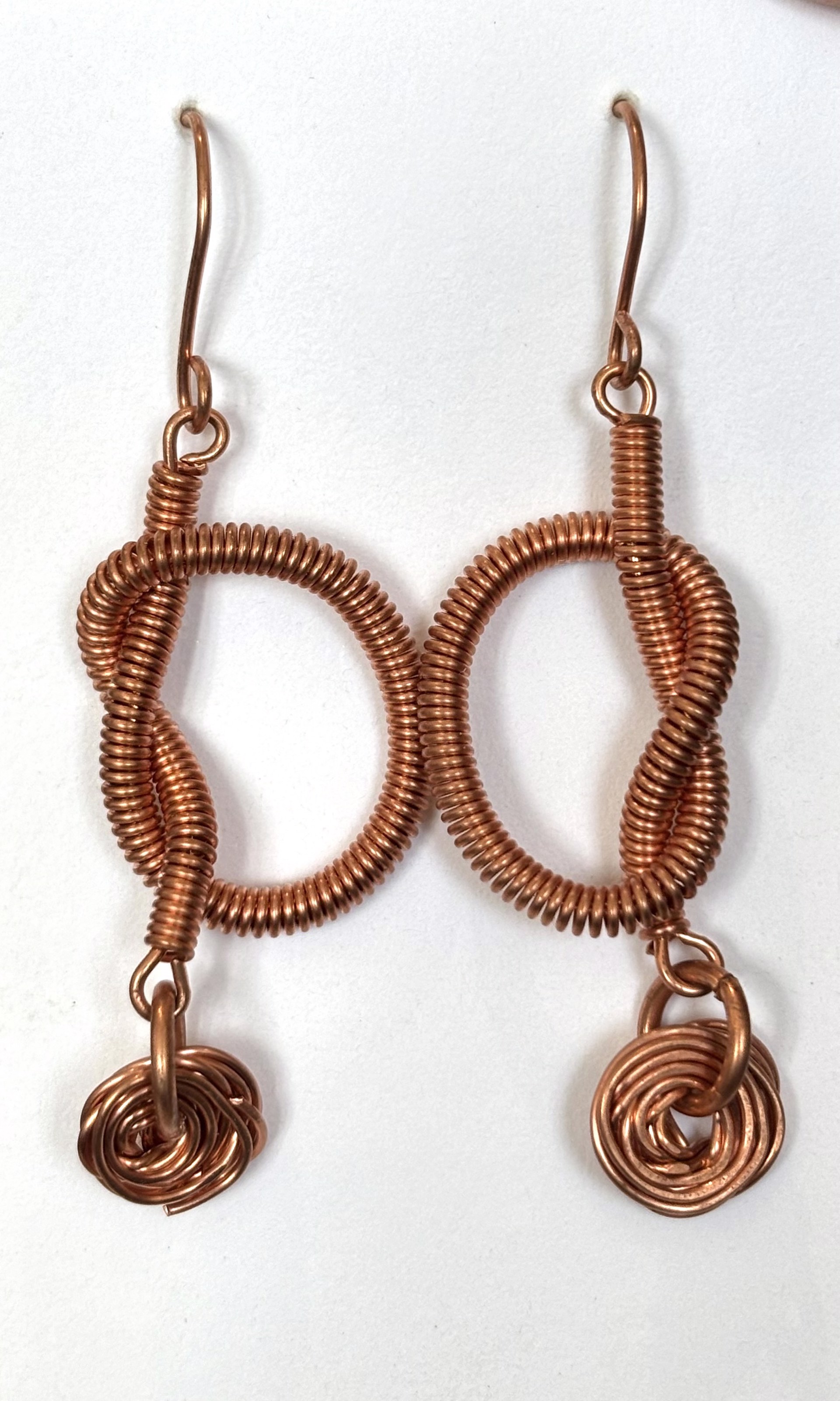 Copper Coil Knot Earrings by Emelie Hebert