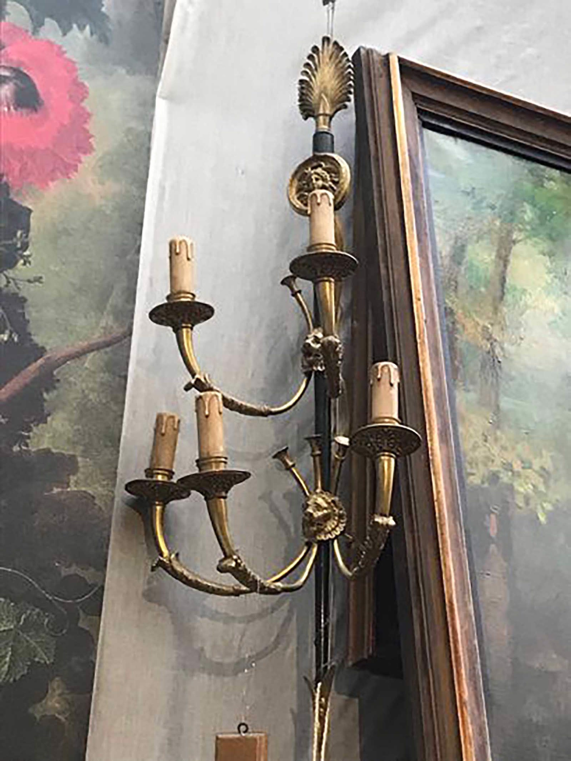 PAIR OF PATINATED AND GILT BRONZE FIVE-LIGHT SCONCES