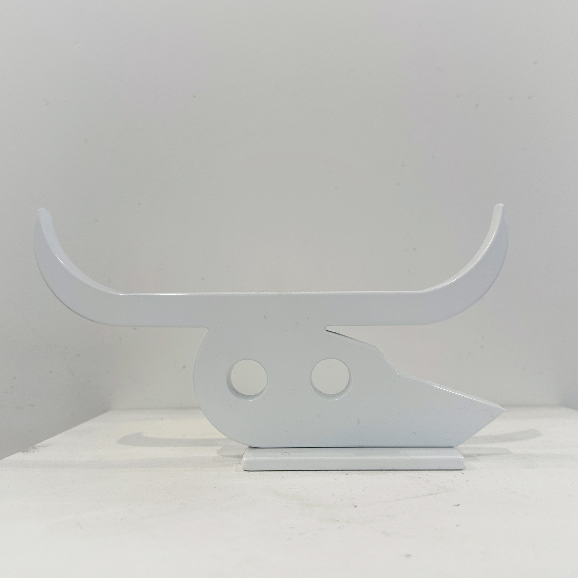 Aluminium Sculpture By Jeffie Brewer Featuring A Longhorn Skull In Simplified Shapes And White Finish