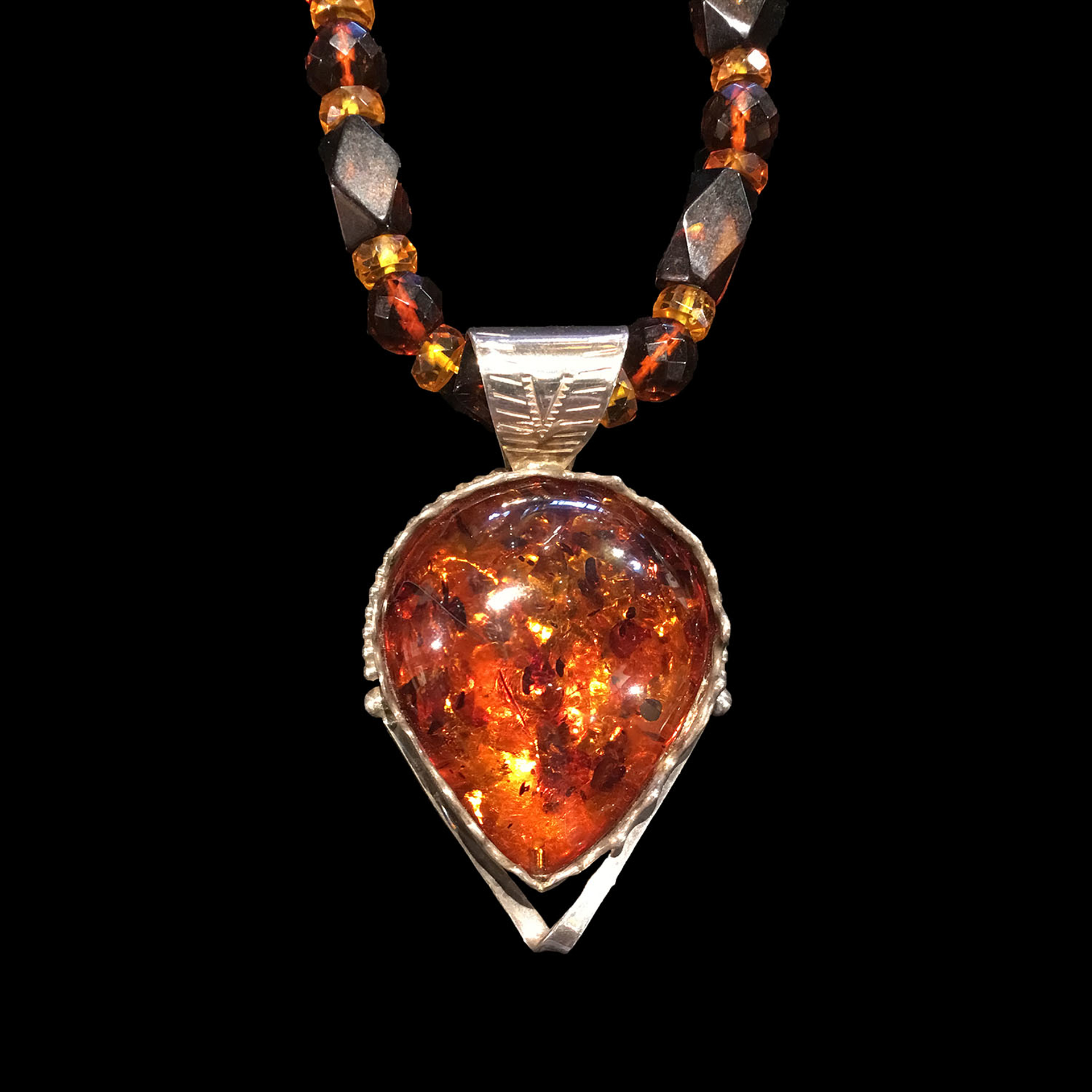 Baltic Amber on amber beads by Michael Redhawk