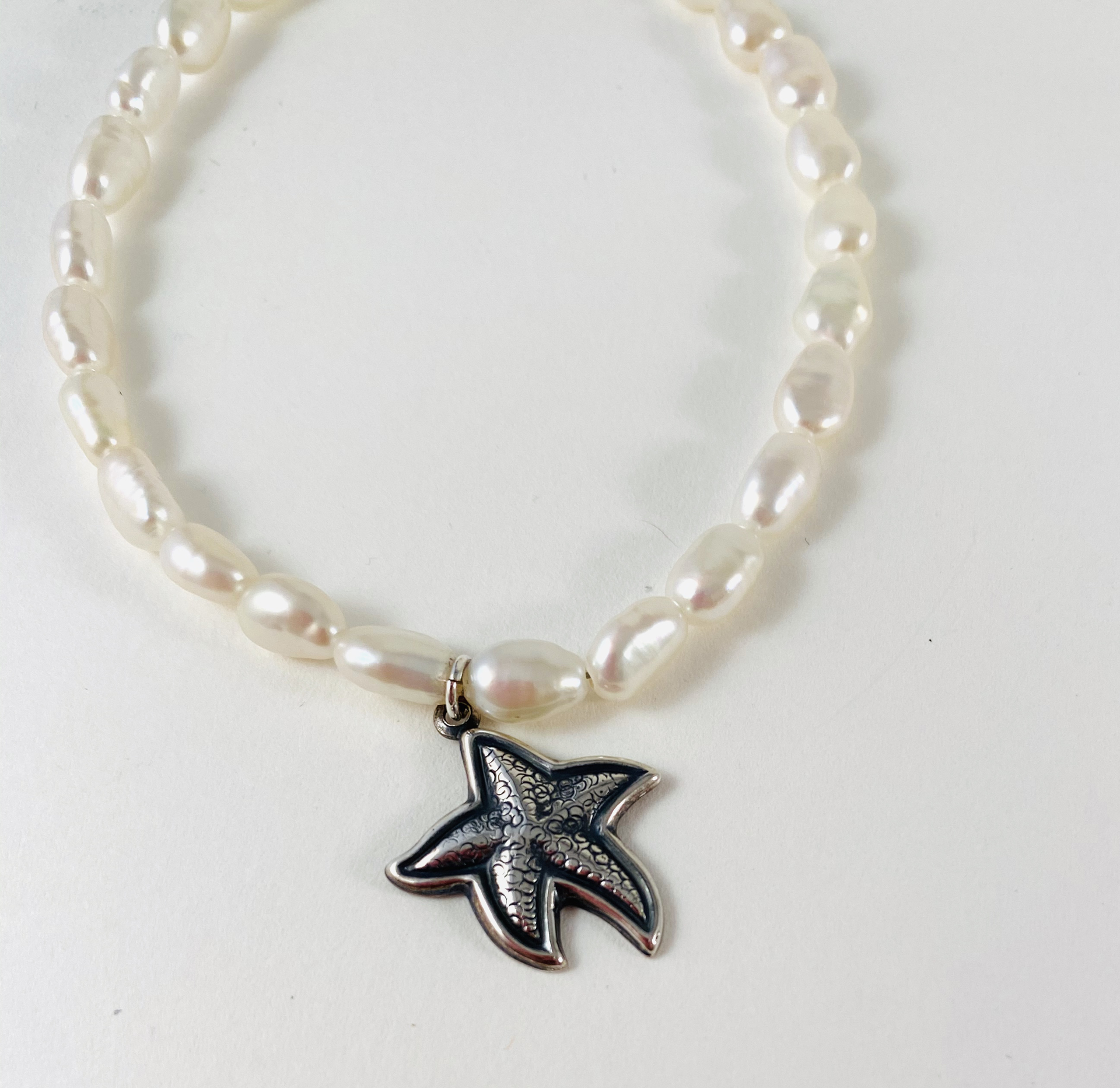 White Pearl Bracelet, starfish charm (ss) P15 by Nance Trueworthy
