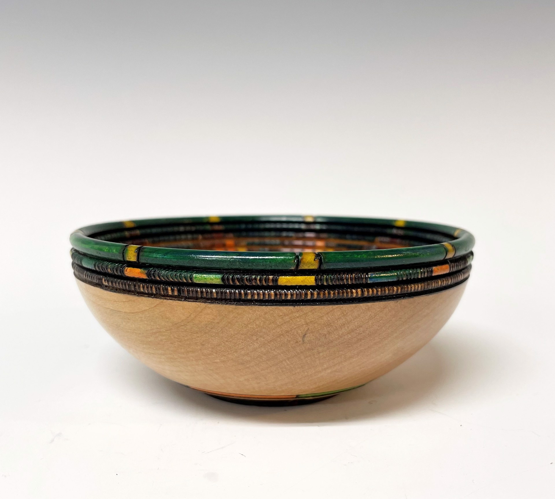Brown, Orange and Yellow Bowl with Green Rim by Keoni