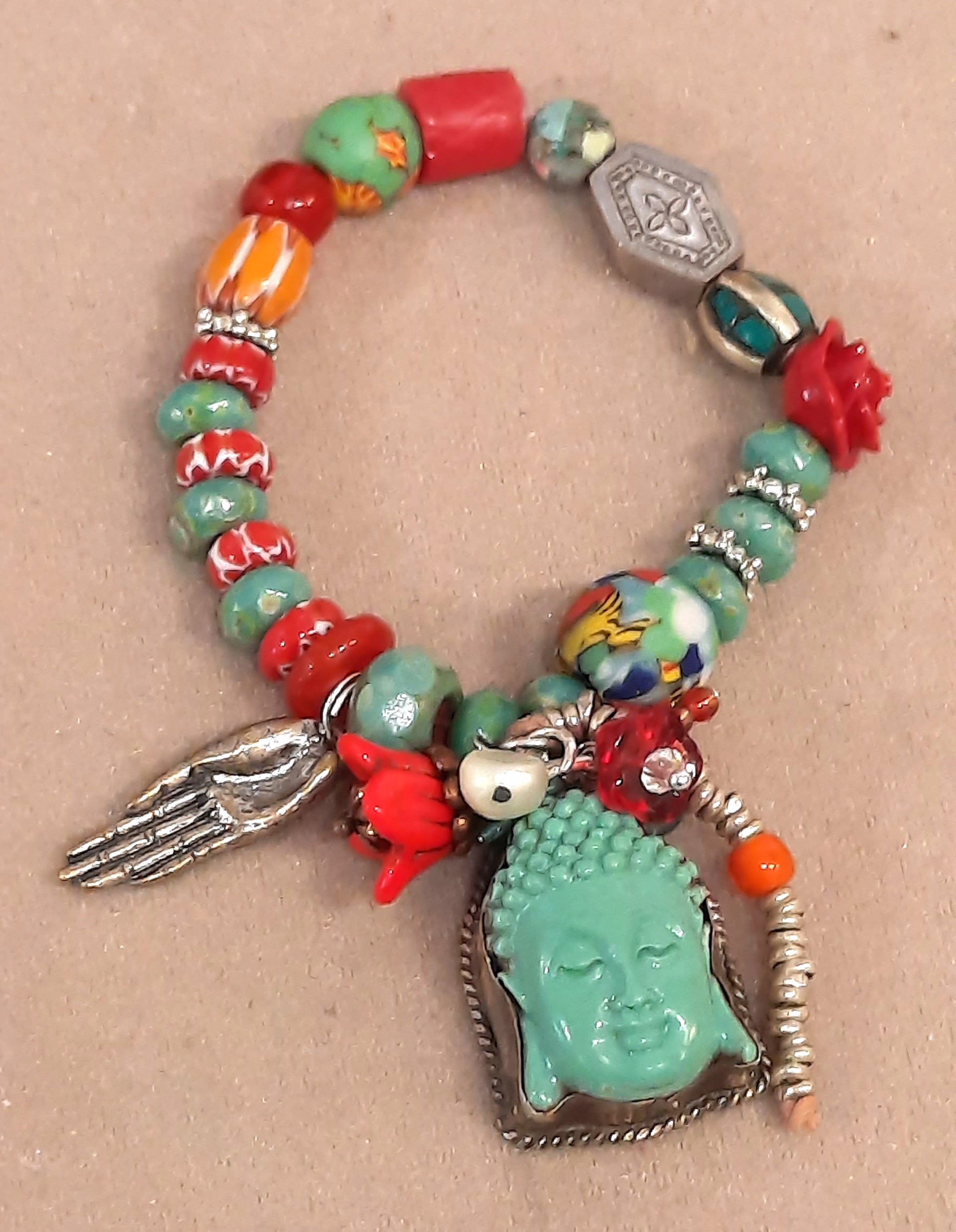 Turquoise Buddha Red Beads 9 by Melissa Turney