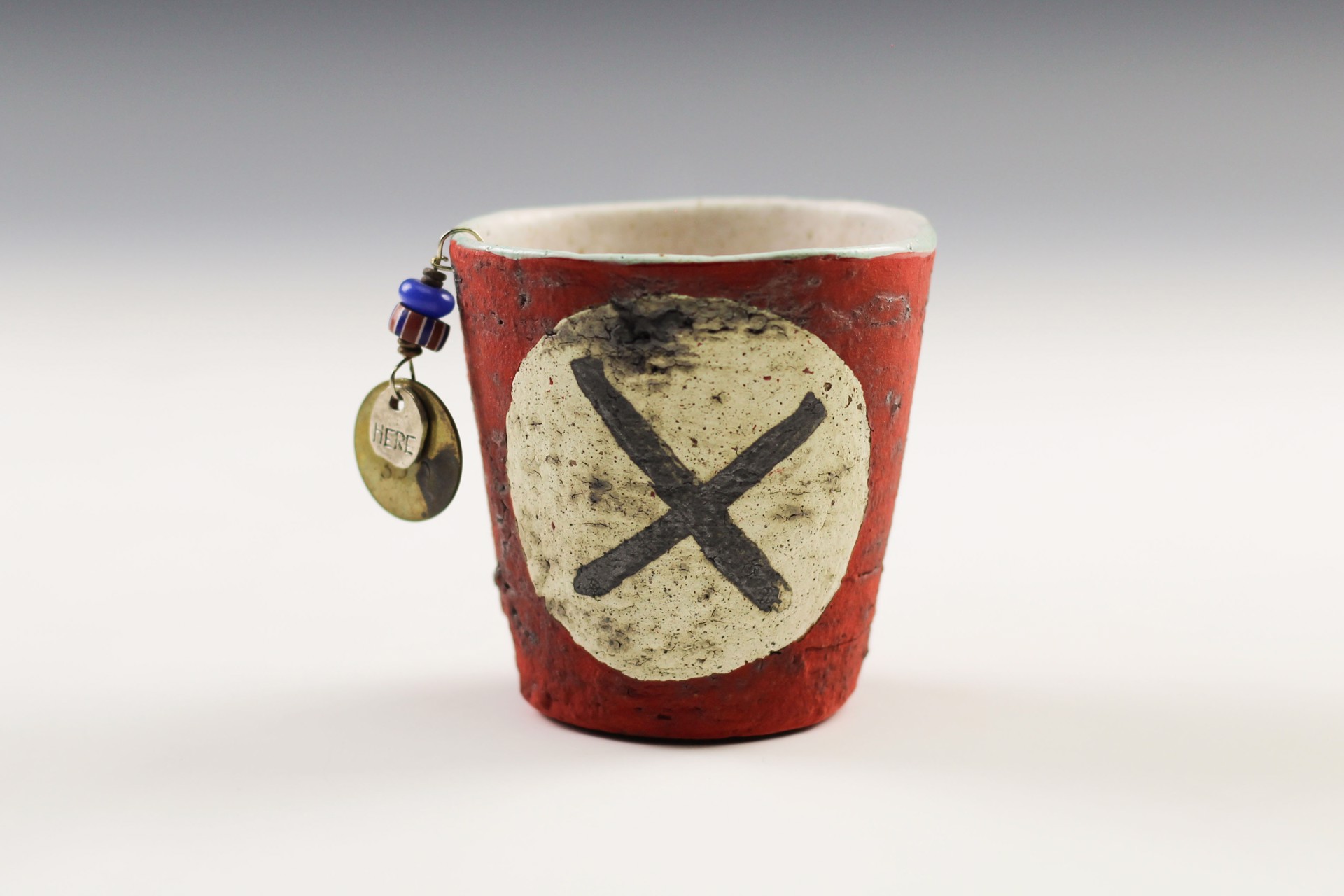 Red X Whiskey Cup by Nancy Kubale