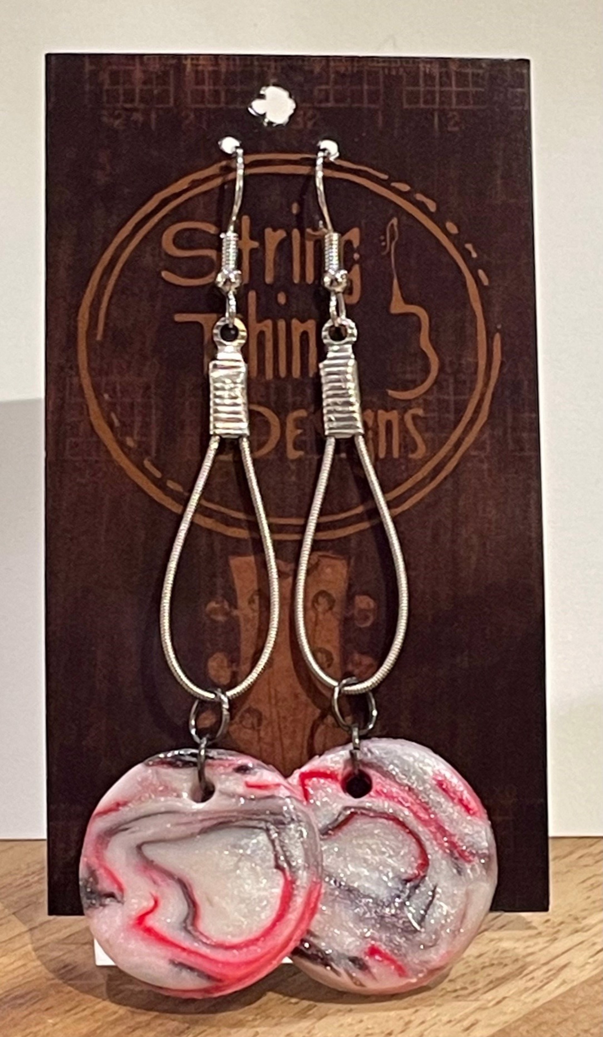White Round Guitar String Earrings by String Thing Designs