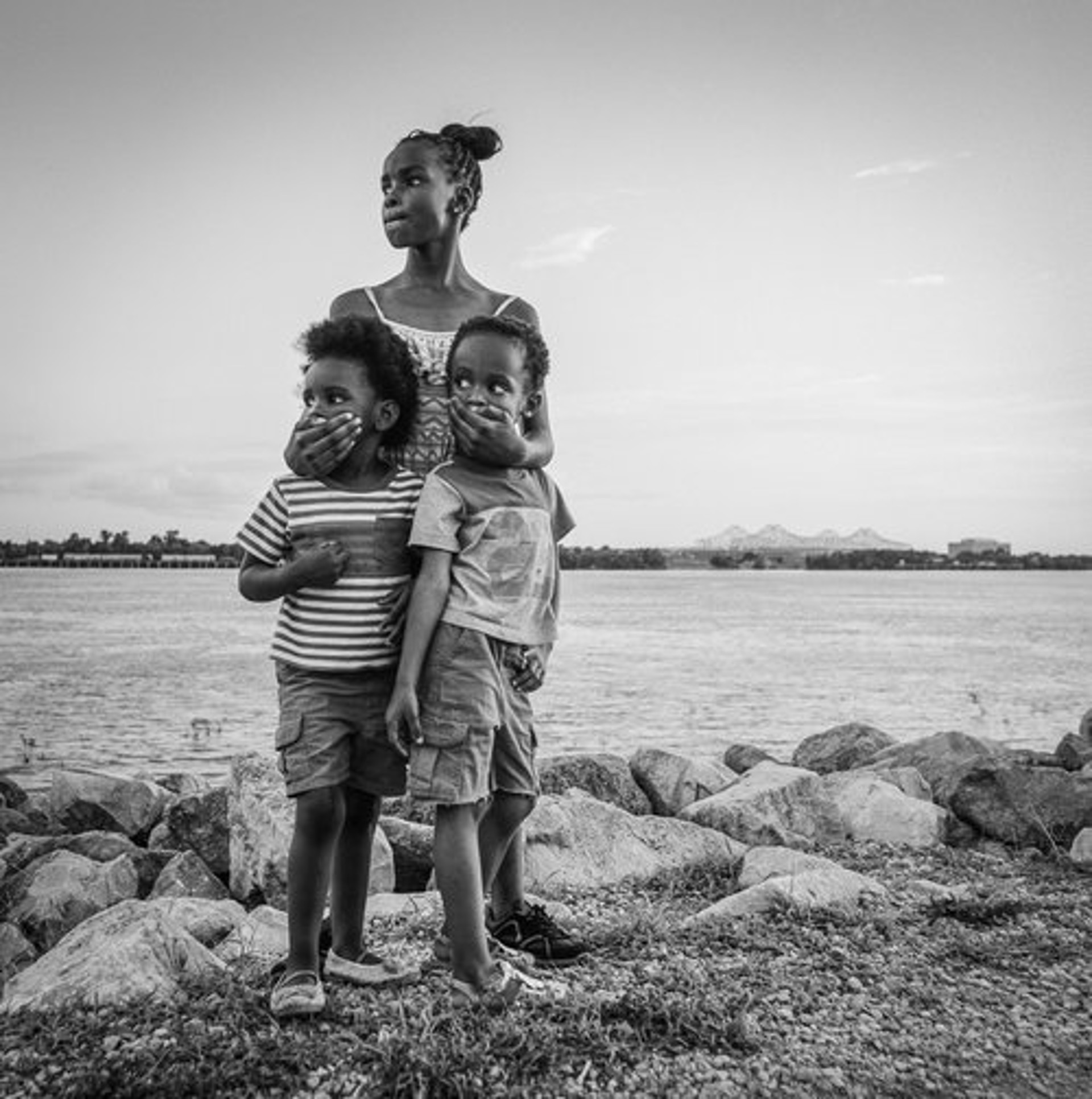 3 Siblings Along the Mississippi River by Kevin Greenblat