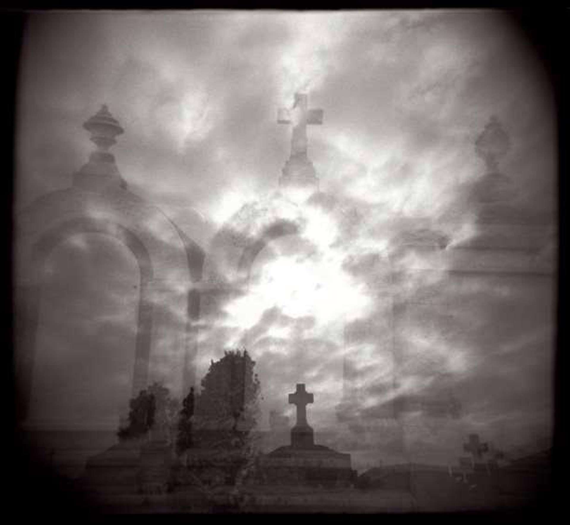 Tombs + Sky, St. Louis Cemetary, New Orleans, LA by Leslie Addison