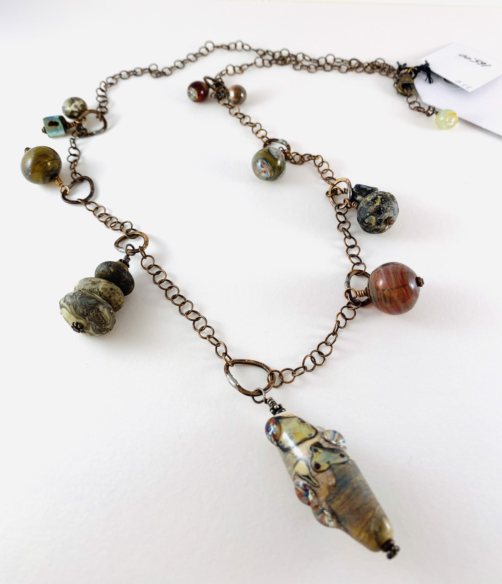 LS20-328 Ivory, Raku and Murrini Beads on Handmade Bronze Link Necklace by Linda Sacra