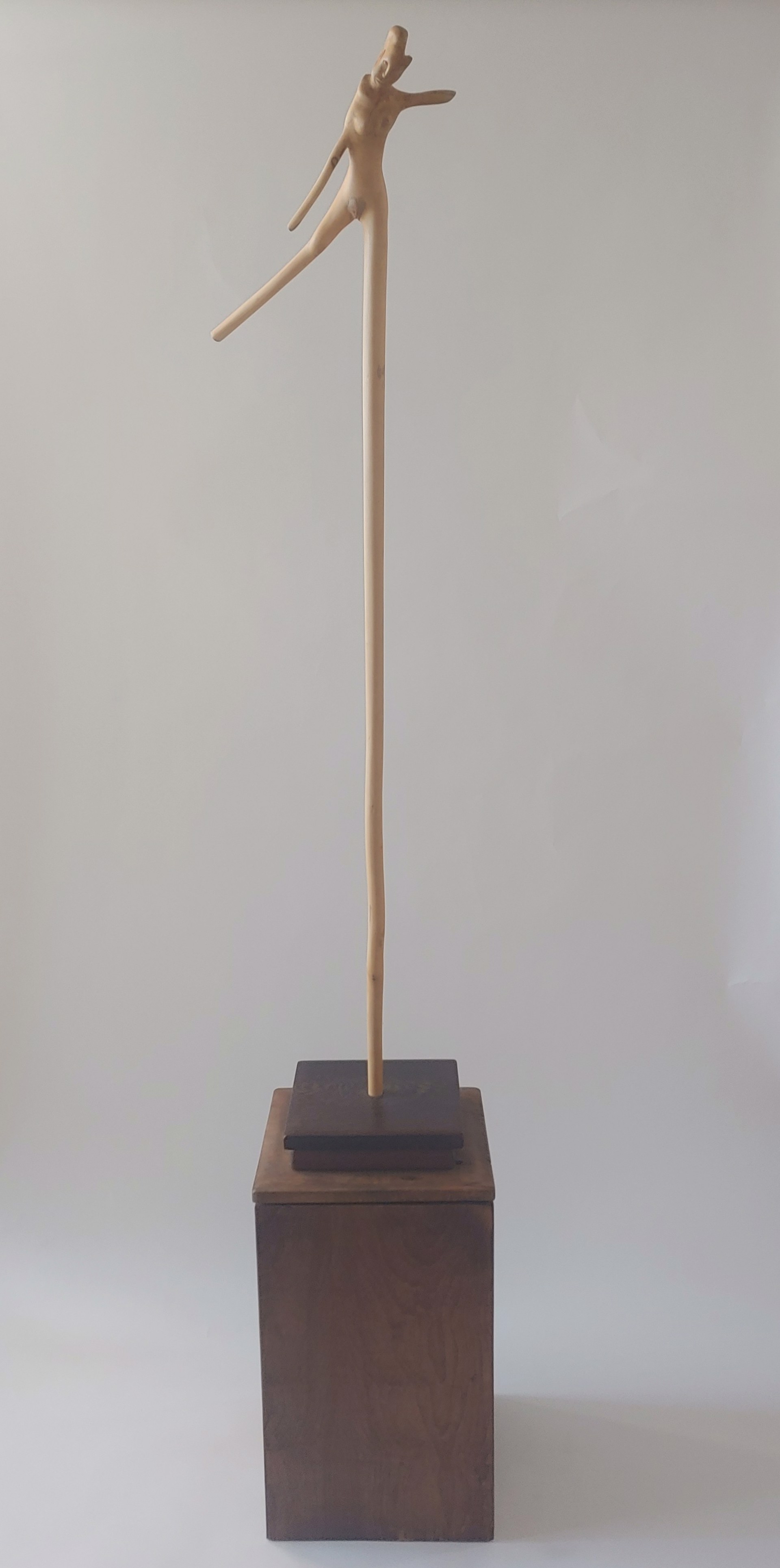 Anjelique Walking Stick on Rolling Base - Wood Sculpture by David Amdur