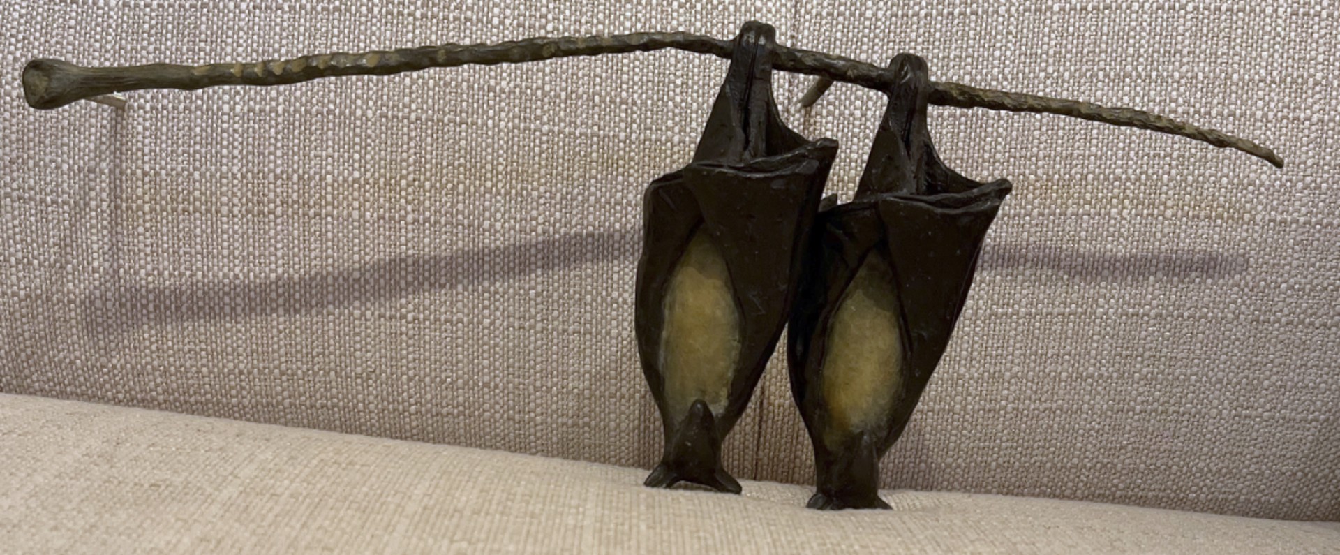 Pair of Temple Bats on a Branch, yellow bellies by Copper Tritscheller