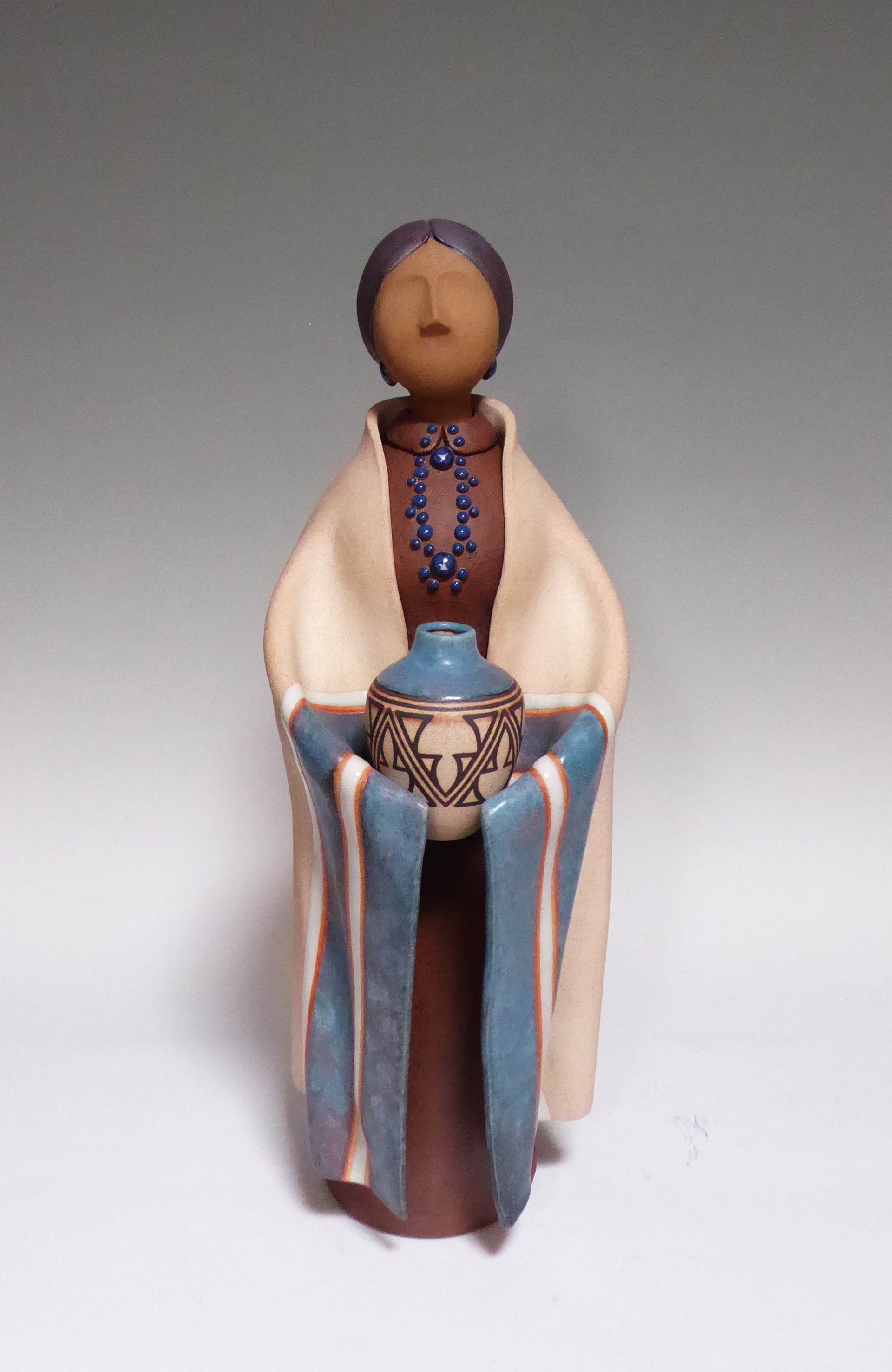 Navajo Women ~ Standing Blue Blanket with Blue Pottery by Terry Slonaker