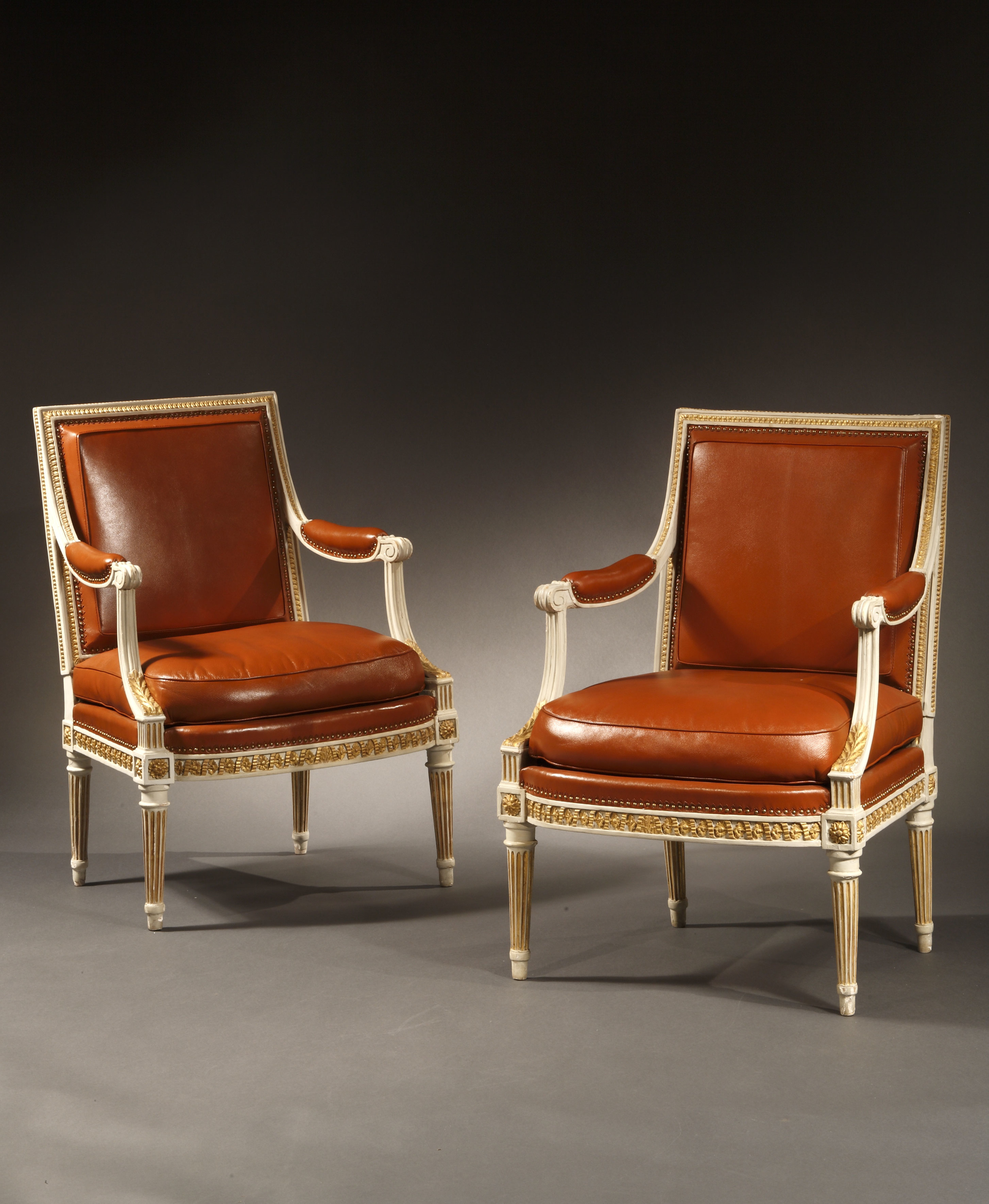 PAIR OF LOUIS XVI PAINTED AND PARCEL GILT FAUTEUILS STAMPED H. JACOB by Henri Jacob