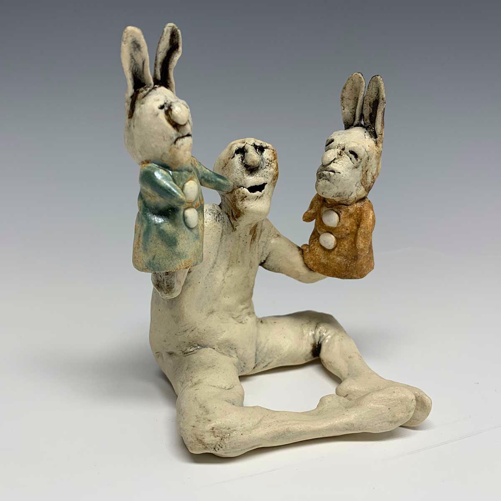 Puppet Man - Two Rabbits by Aggie Zed