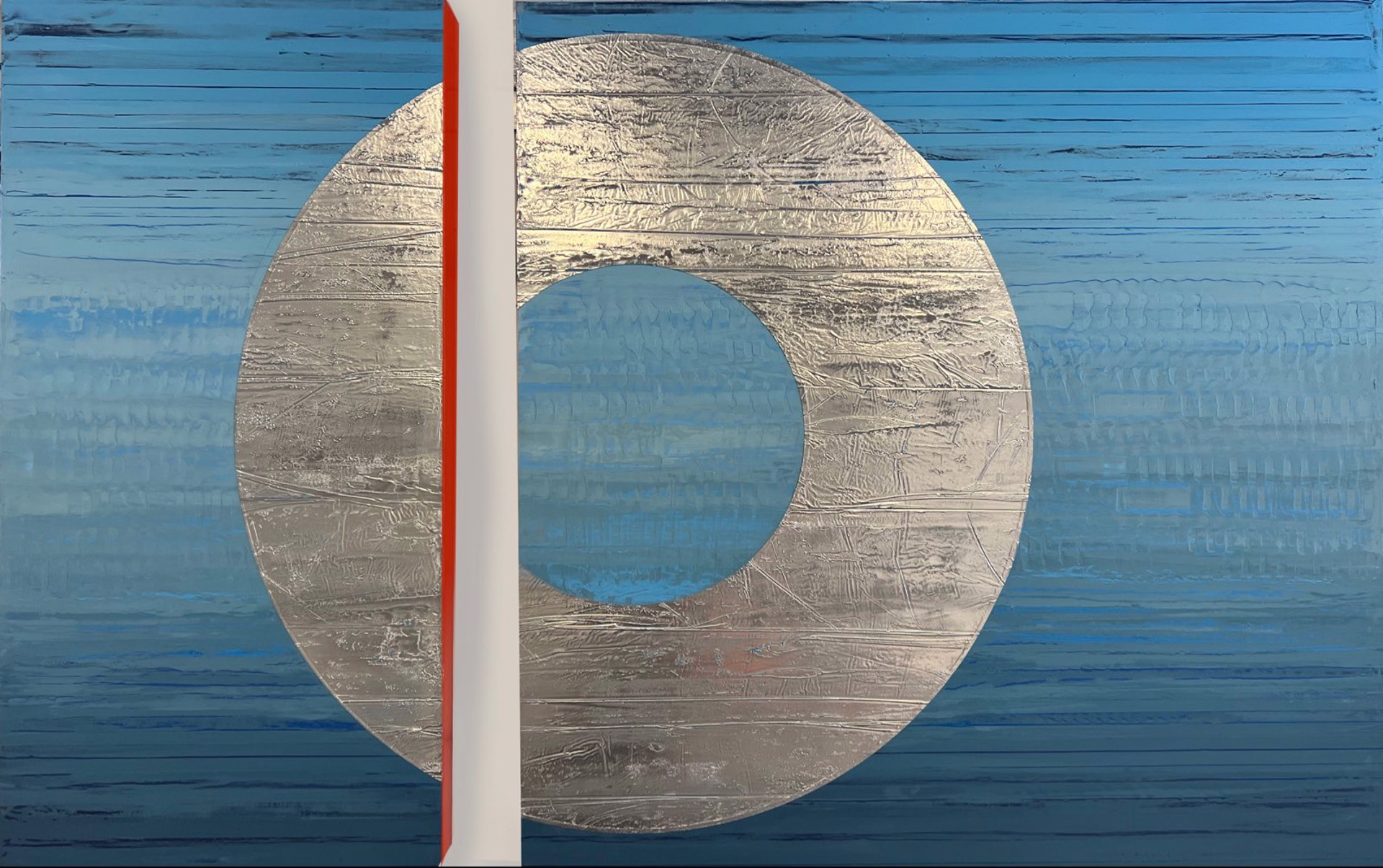 California artist and painter Stephanie Paige's new Honoring Self is a beautiful diptych made of two wood panels with layers of blue marble plaster paint and silver leaf for the circle. It has crimson red interior sides.  