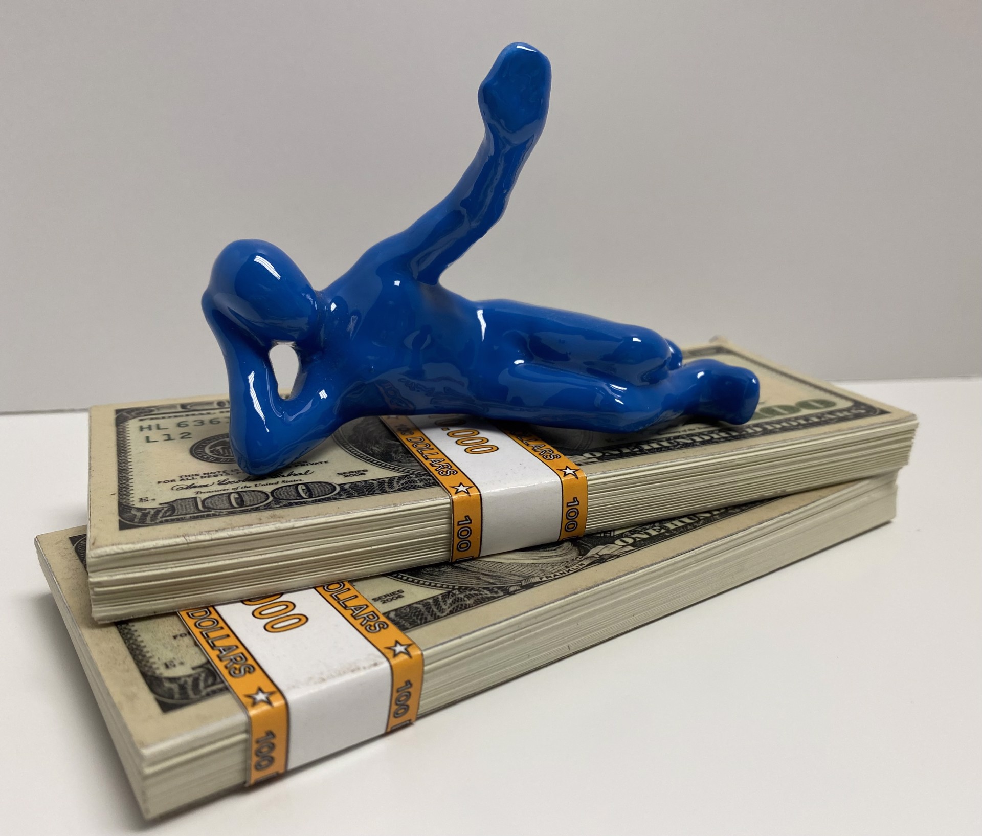 People With $$ (blue figure) by Ancizar Marin