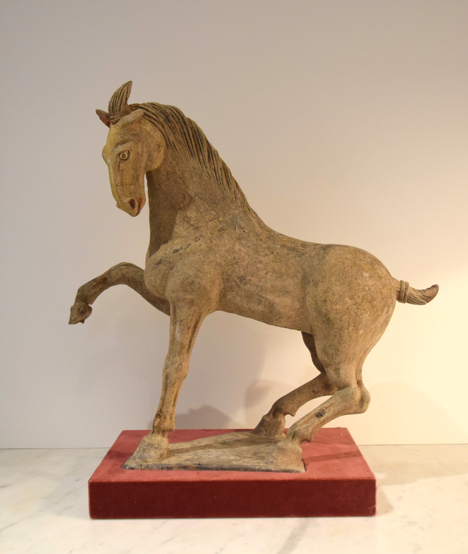POTTERY FIGURE OF A PRANCING HORSE