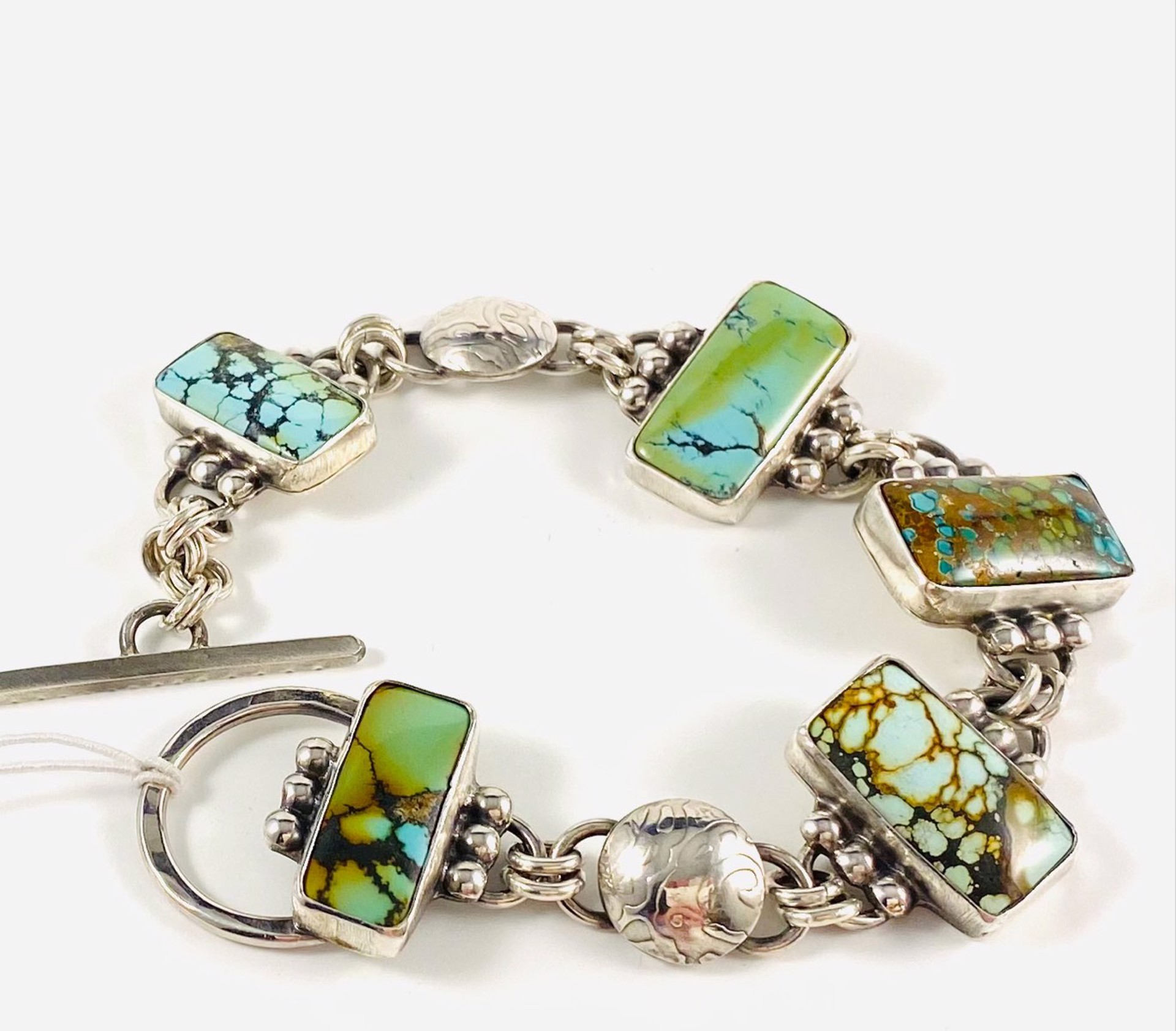 AB22-80 FiveTreasure Mountain Turquoise Rectangles each set with six beads and Two Silver Dome spacers Link Bracelet by Anne Bivens