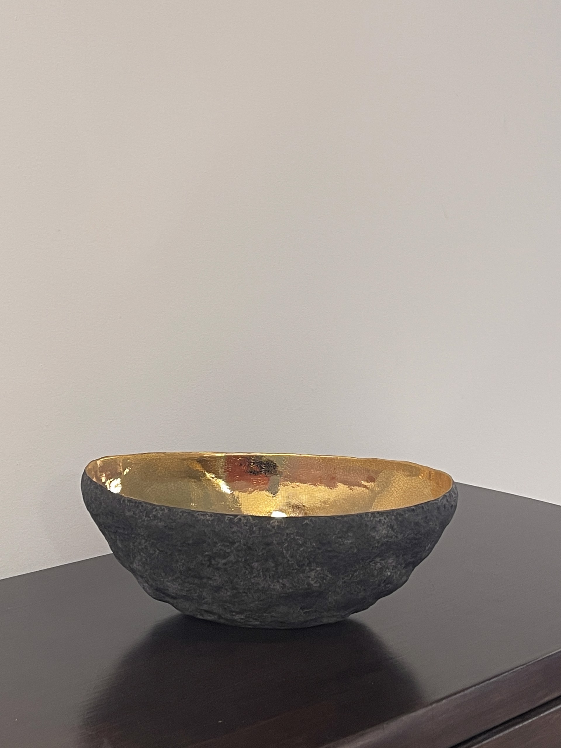 Oval vessel with gold by Cristina Salusti