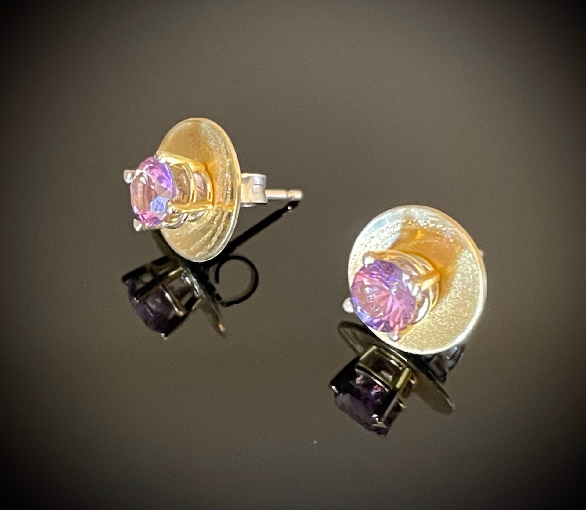 Starry Nights Earrings with reversible jackets (one side Gold, one side Silver) and can wear studs alone. by Celest Michelotti