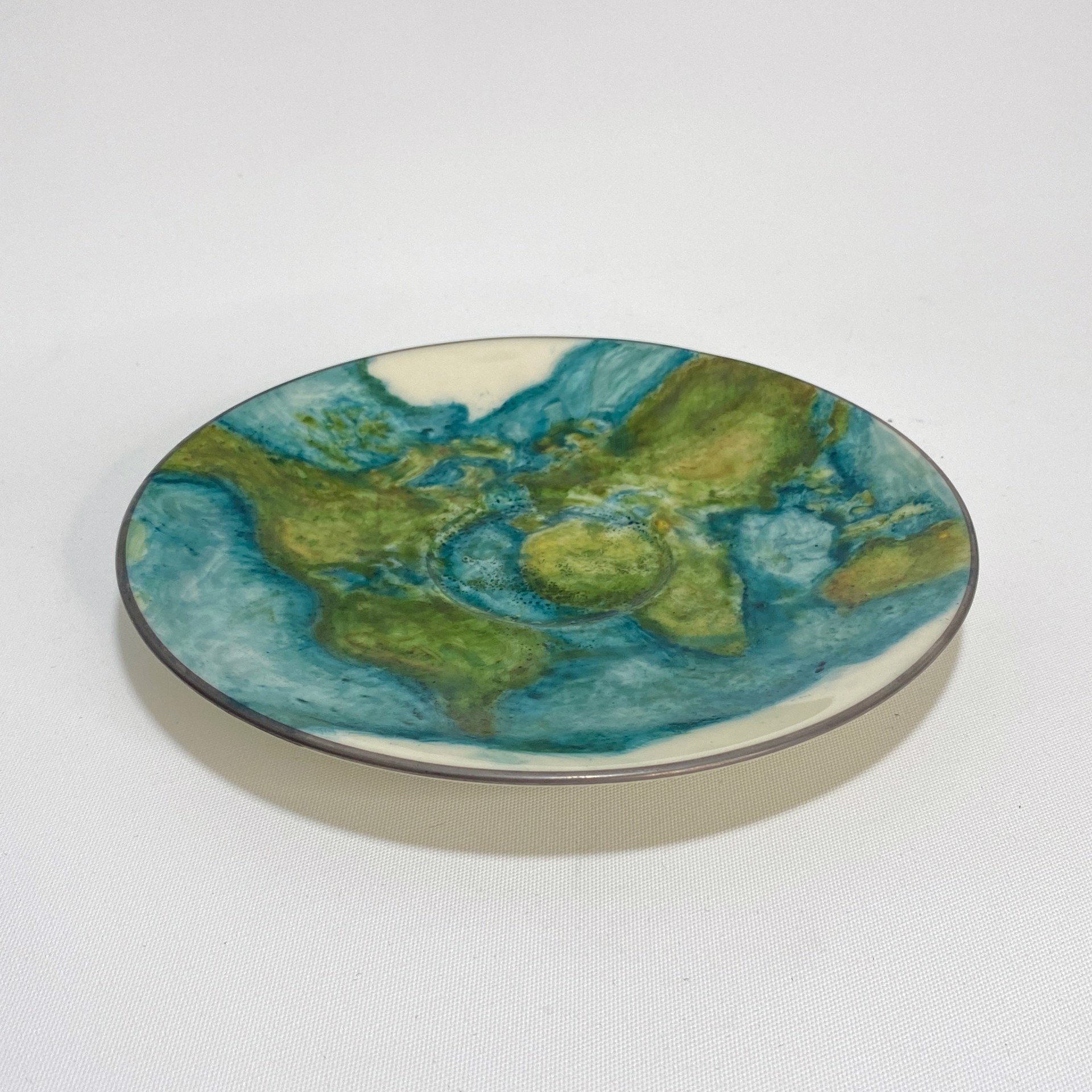 Flat Earth Saucer by Catherine Ruiz