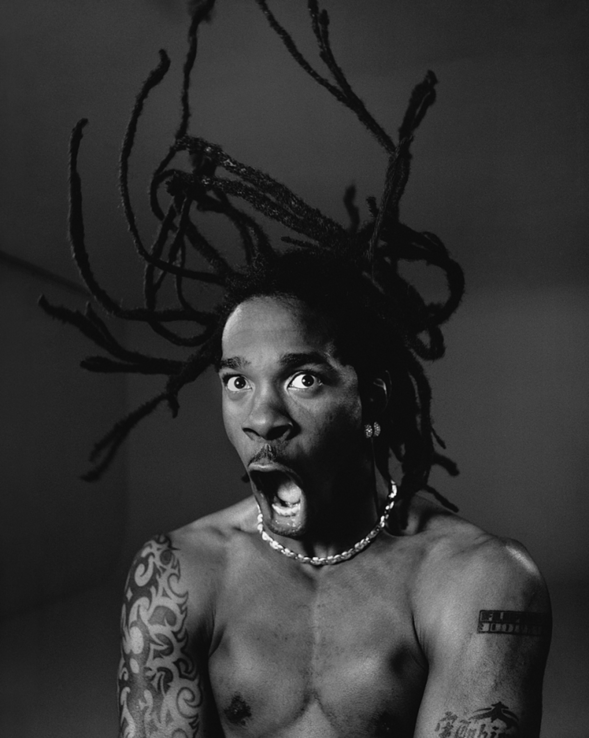 97046 Busta Rhymes Dreds Blowing BW by Timothy White
