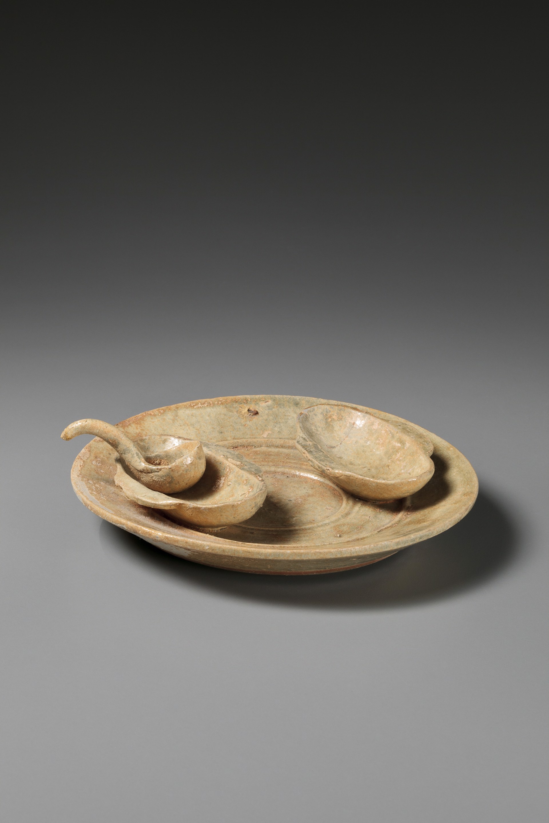 DISH WITH TWO EAR SHAPED CUPS AND A SMALL LADLE