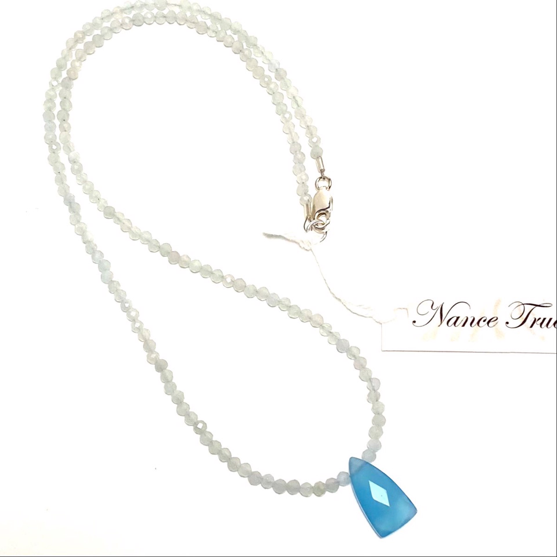 NT22-182 Tiny Faceted Aquamarine Blue Chalcedony Drop Necklace by Nance Trueworthy