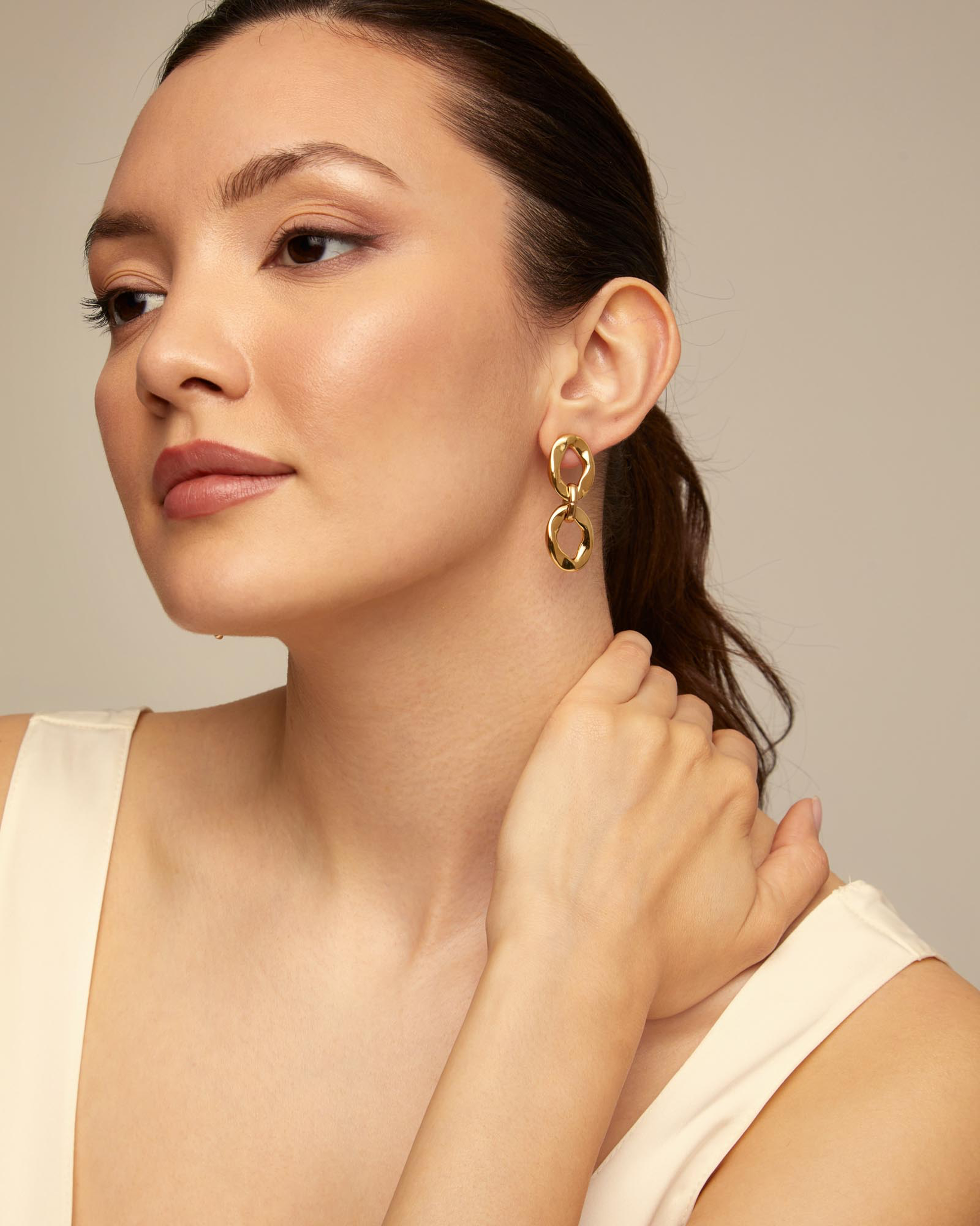 Gold Plated Groovy Earrings by UNO DE 50