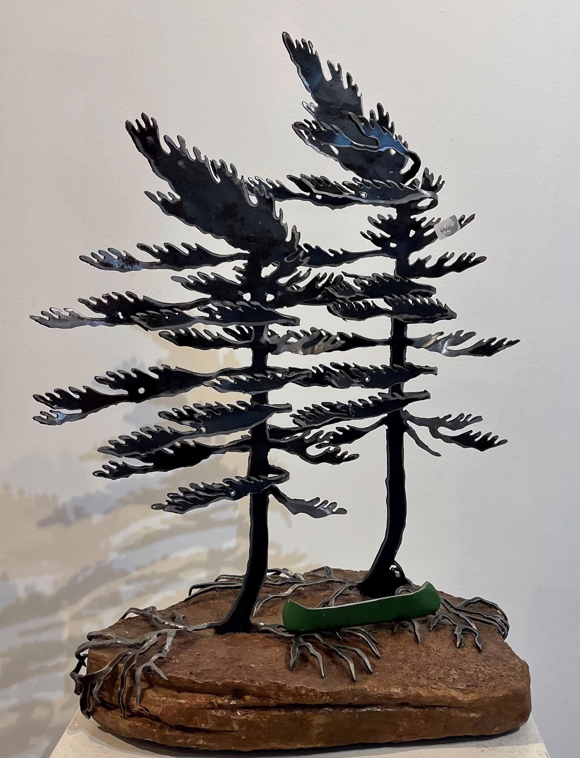 Two Windswept Pine with Green Canoe on Rock 659356 by Cathy Mark