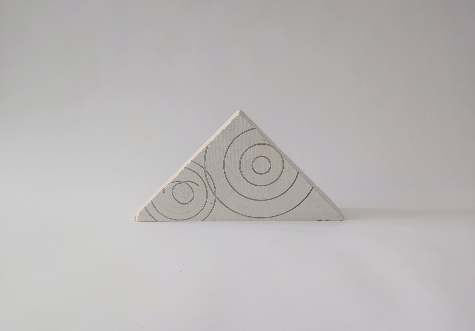 Triangle w/ Swirls - Stone Sculpture by David Amdur