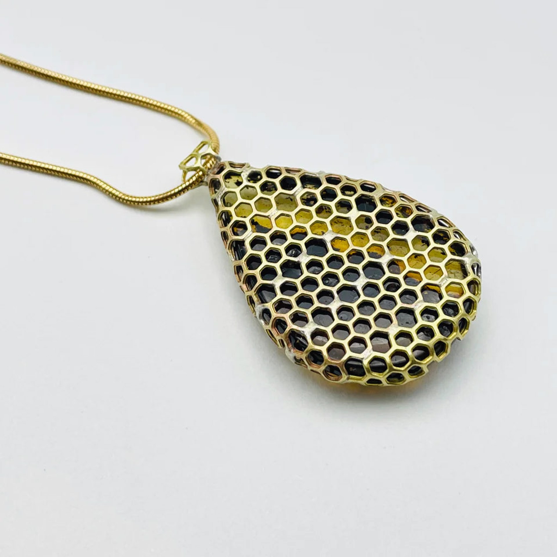 Amber Brass Honeycomb wrap pendant by Bee Amour