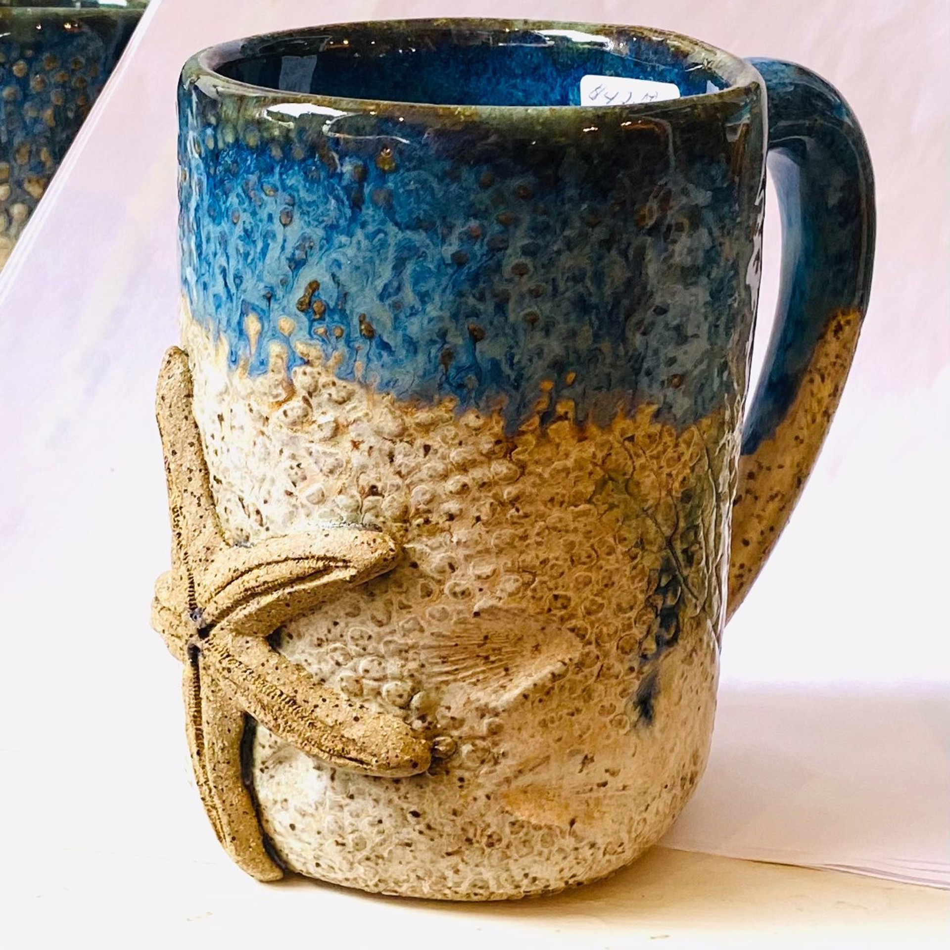 Logan22-785  Starfish Mug (Blue Glaze) by Jim & Steffi Logan
