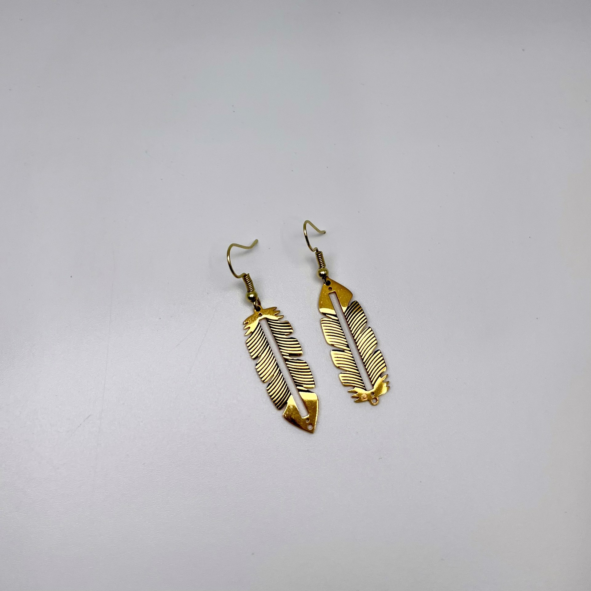 8262 Brass Feather Earrings by Gina Caruso