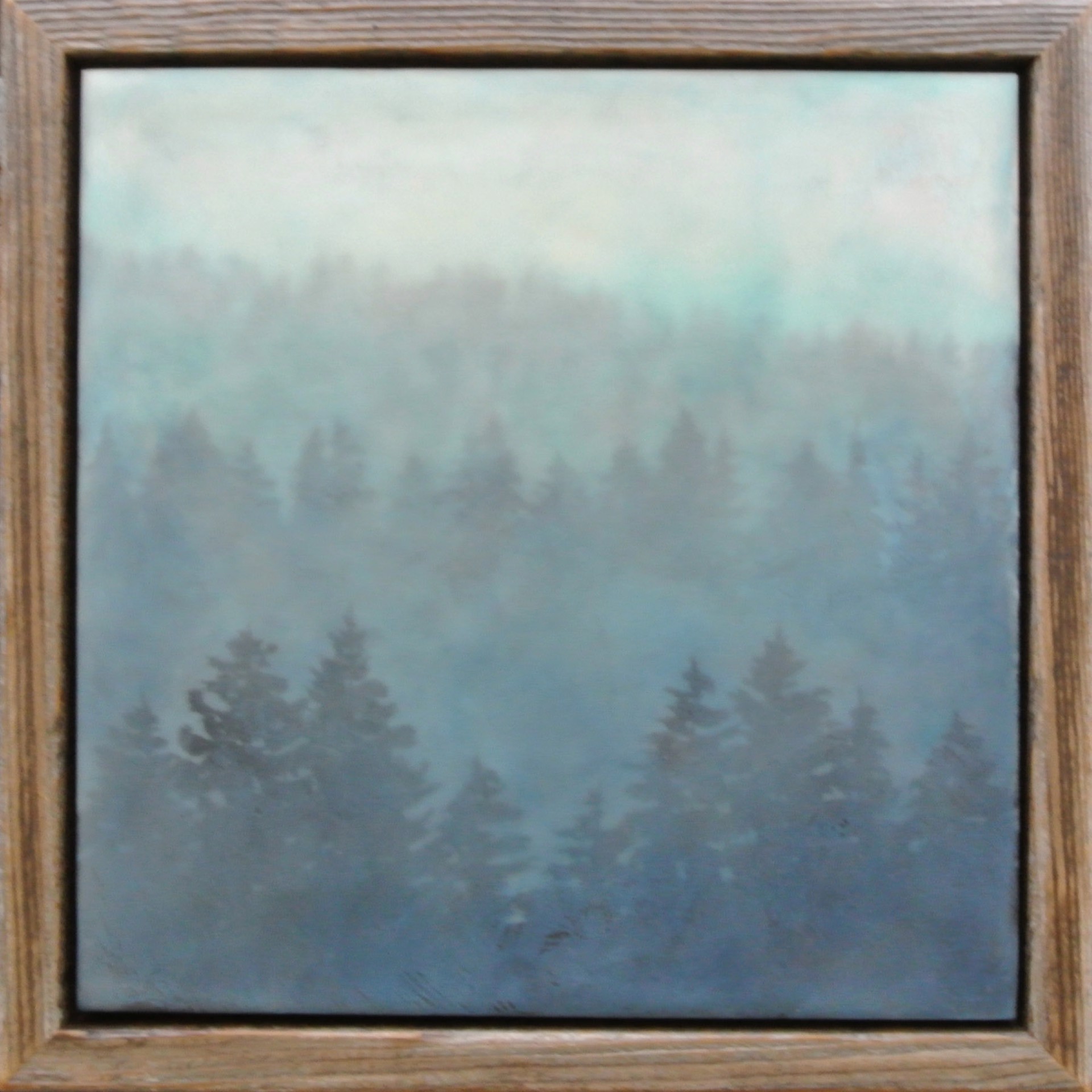 An Encaustic Painting Of A Hazy Layered Pine Forest In Shades Of Blue, By Bridgette Meinhold