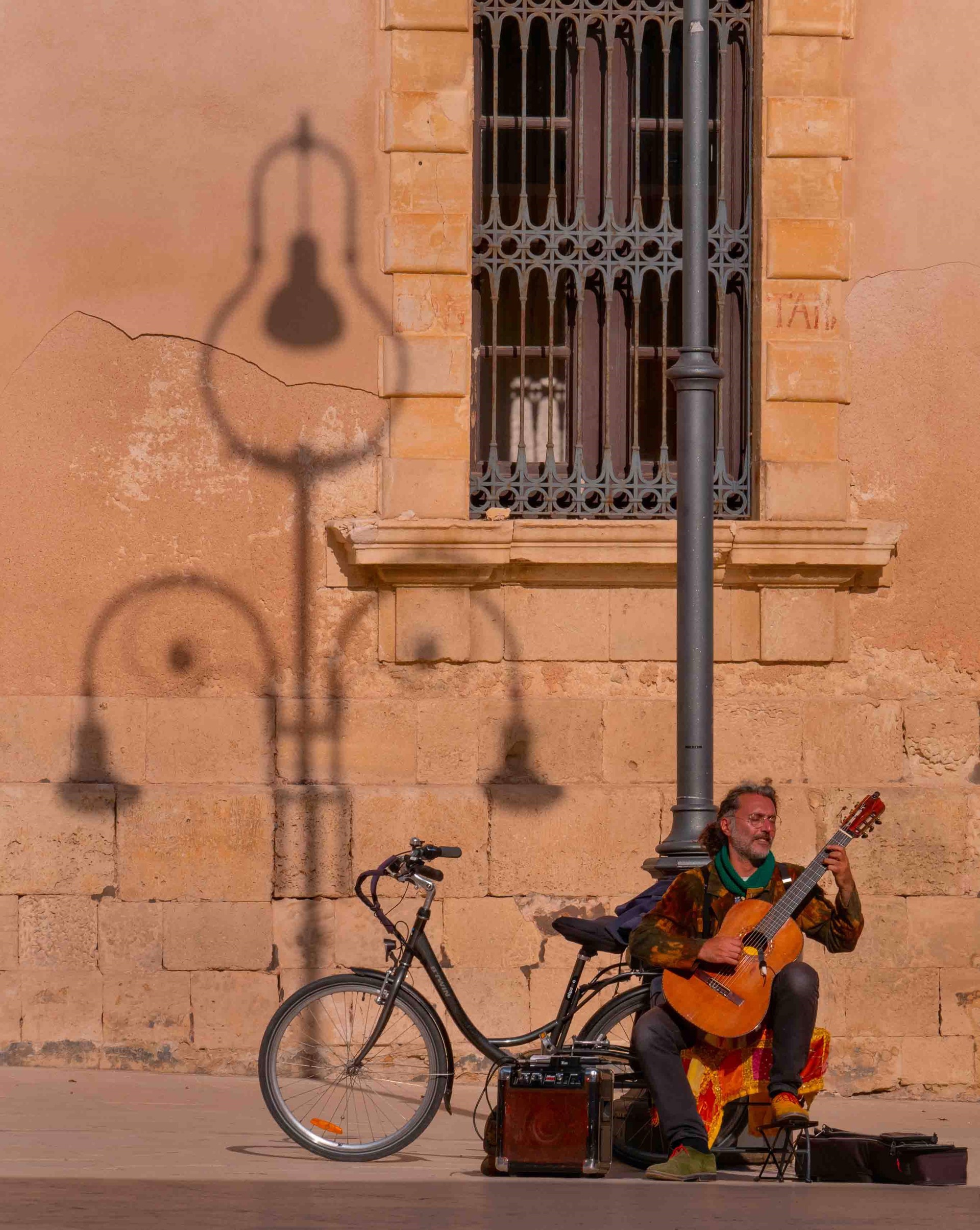 Classical Guitarist at Town Square by Charles Porter