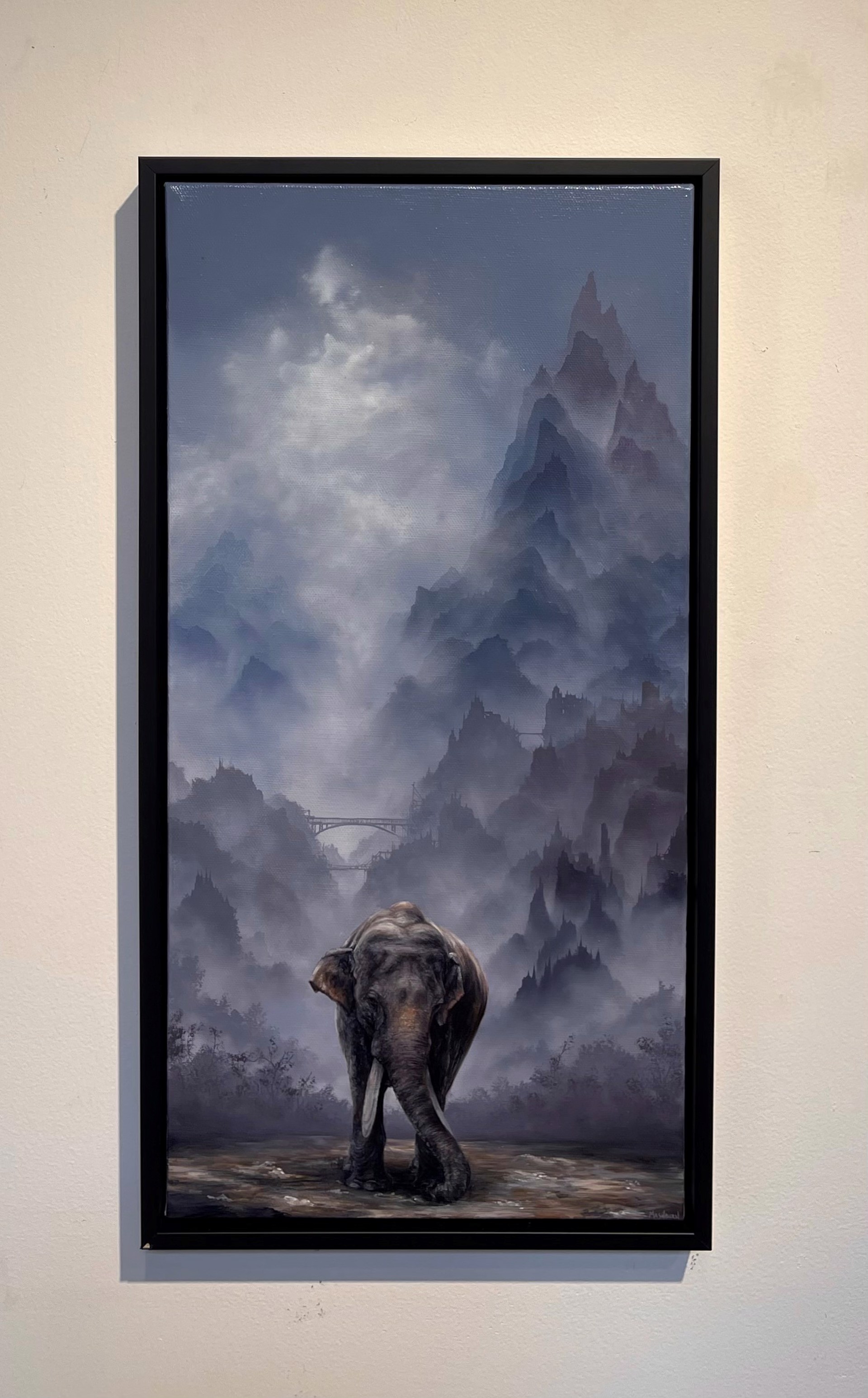 Asian Elephant Standing Before Hazy Blue Mountains by Brian Mashburn