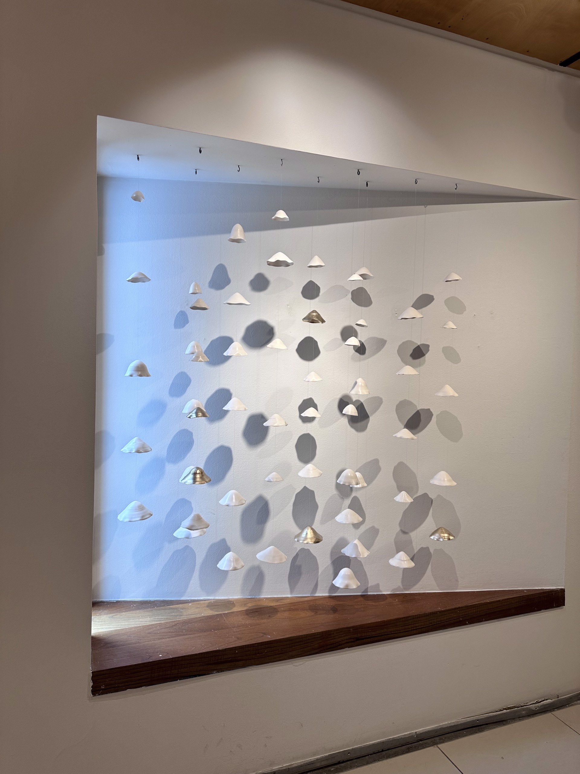 Lucrecia Waggoner Porcelain Wall Installation Custom Artwork Lucrecia Waggoner Floating Garden 2, 2023 Polished porcelain with moongold62 x 59 x 12 in 