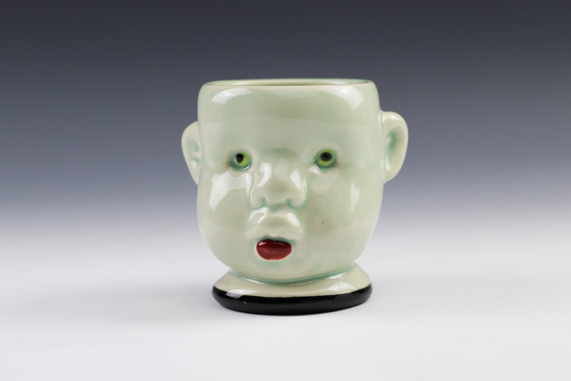 Doll Head Cup by Tom Bartel