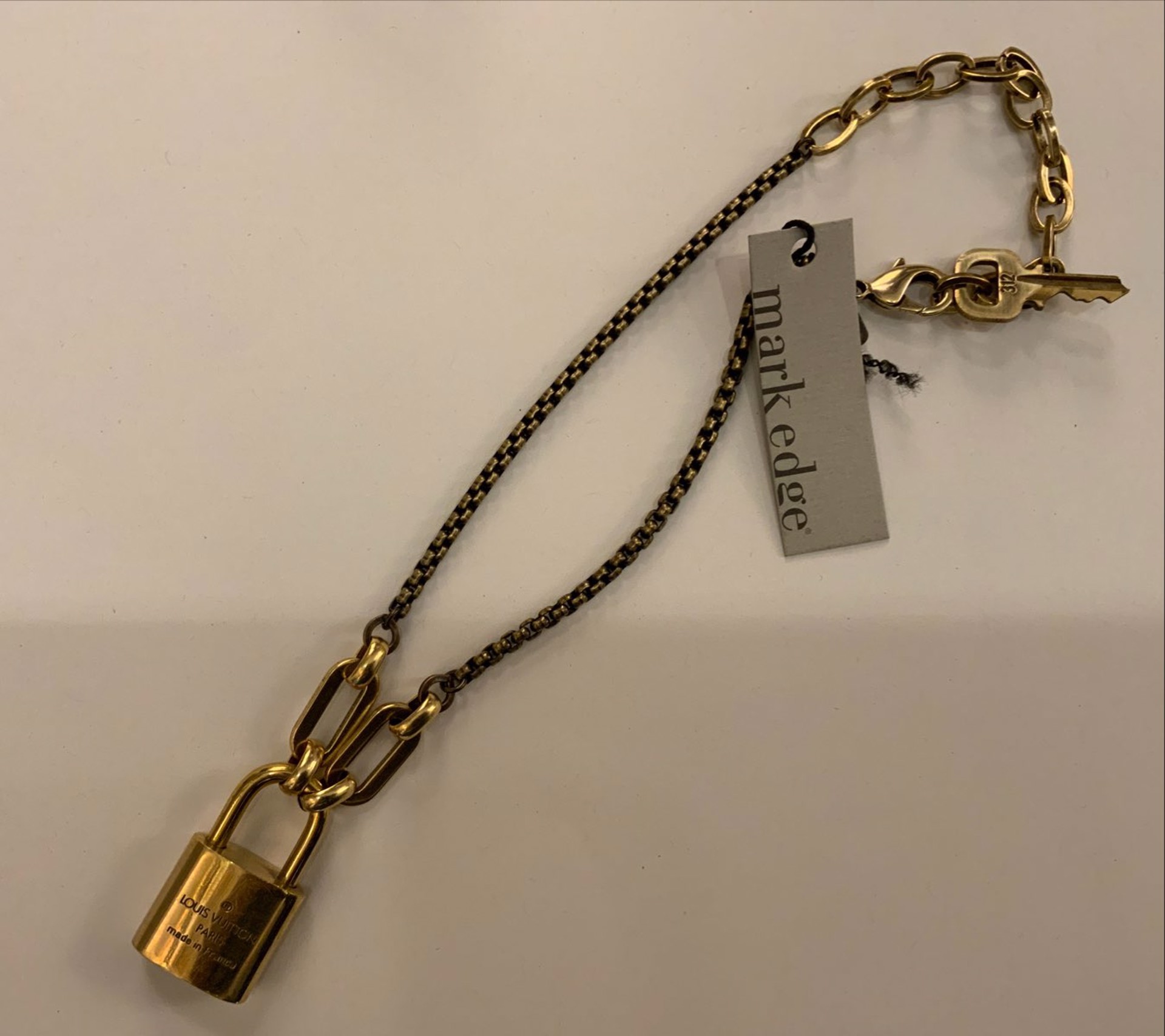 Vintage Louis Vuitton Lock/ Bronze Chain by Mark Edge