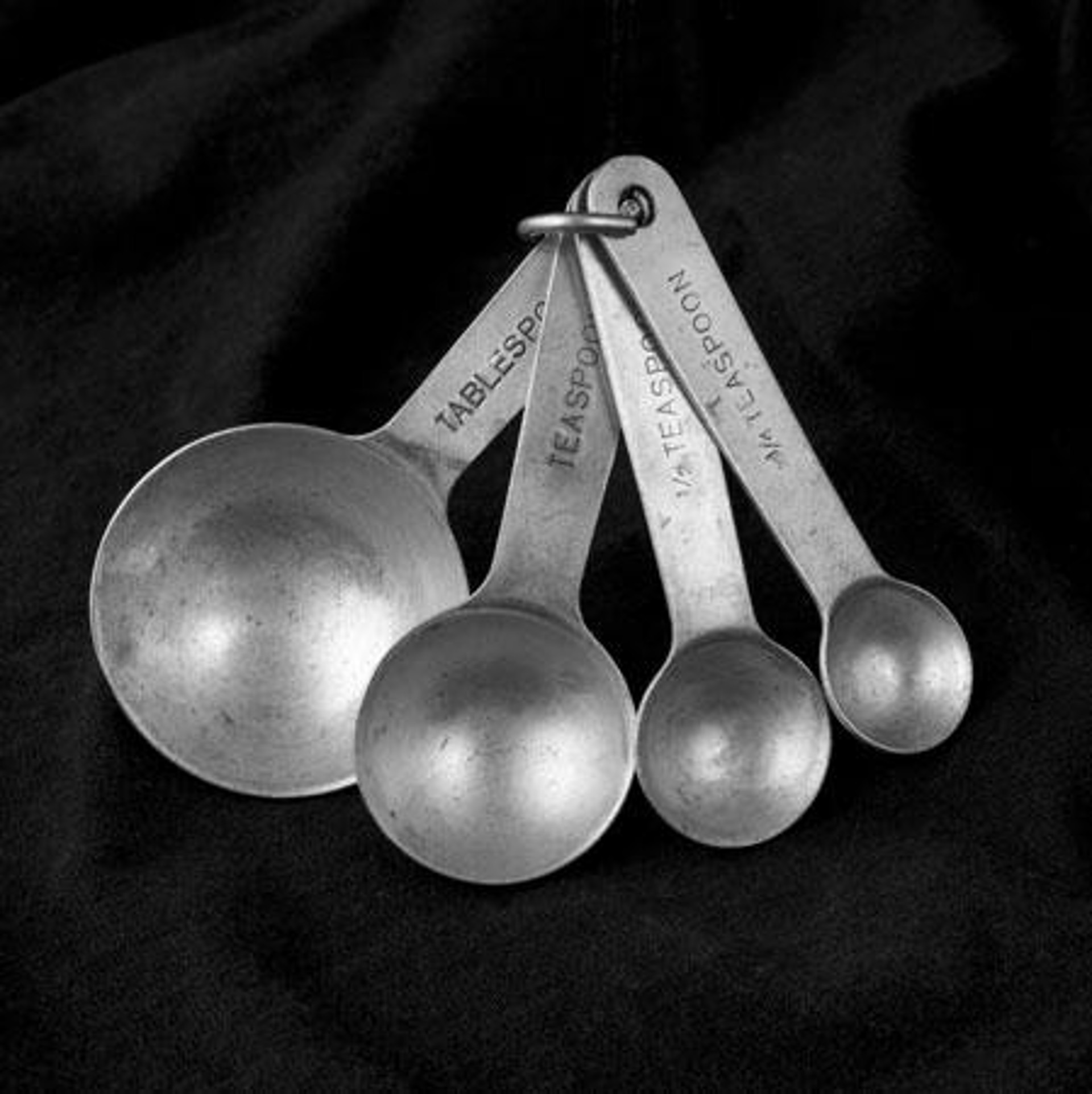 Measuring Spoons by Richard Snodgrass