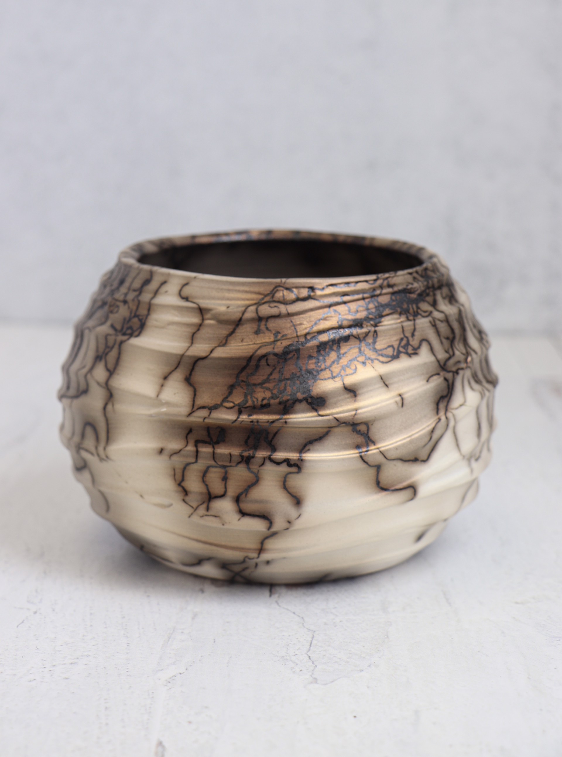 Copper Mica Horsehair Pottery with Wavy Slip by Caroline Renée Woolard