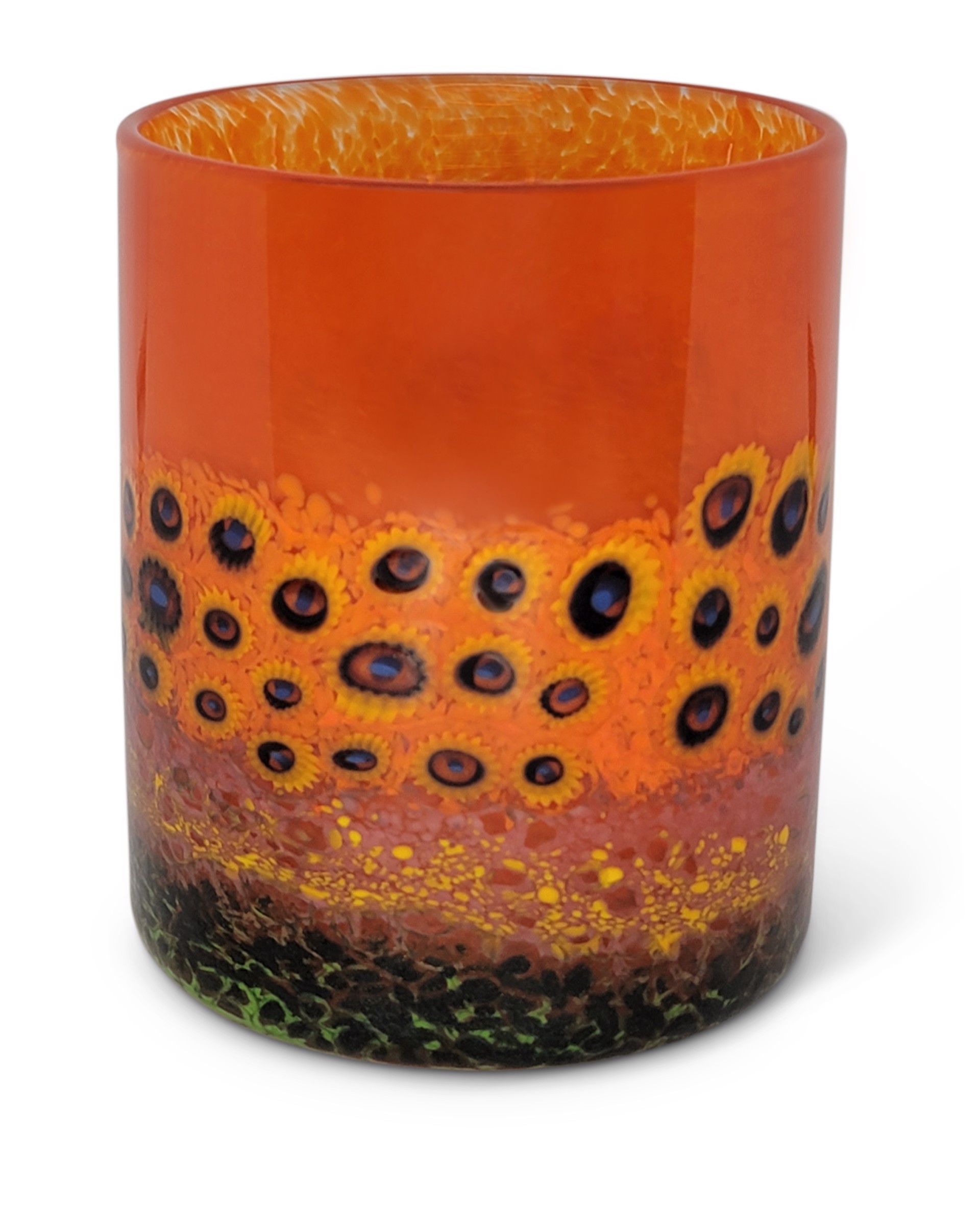 Orange Murrini Sunflower Tumbler ~ Orange Hand-blown double old fashioned drinking glasses with iridescent swirls and yellow floral millefiori. Dishwasher safe. Blown thick and heavy for everyday use. Patterns vary. by Ken Hanson & Ingrid Hanson