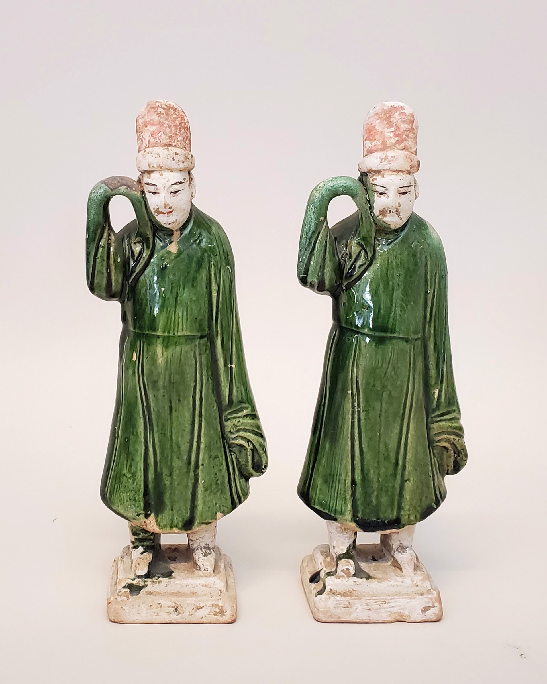 TWO GREEN-GLAZED POTTERY FIGURES
