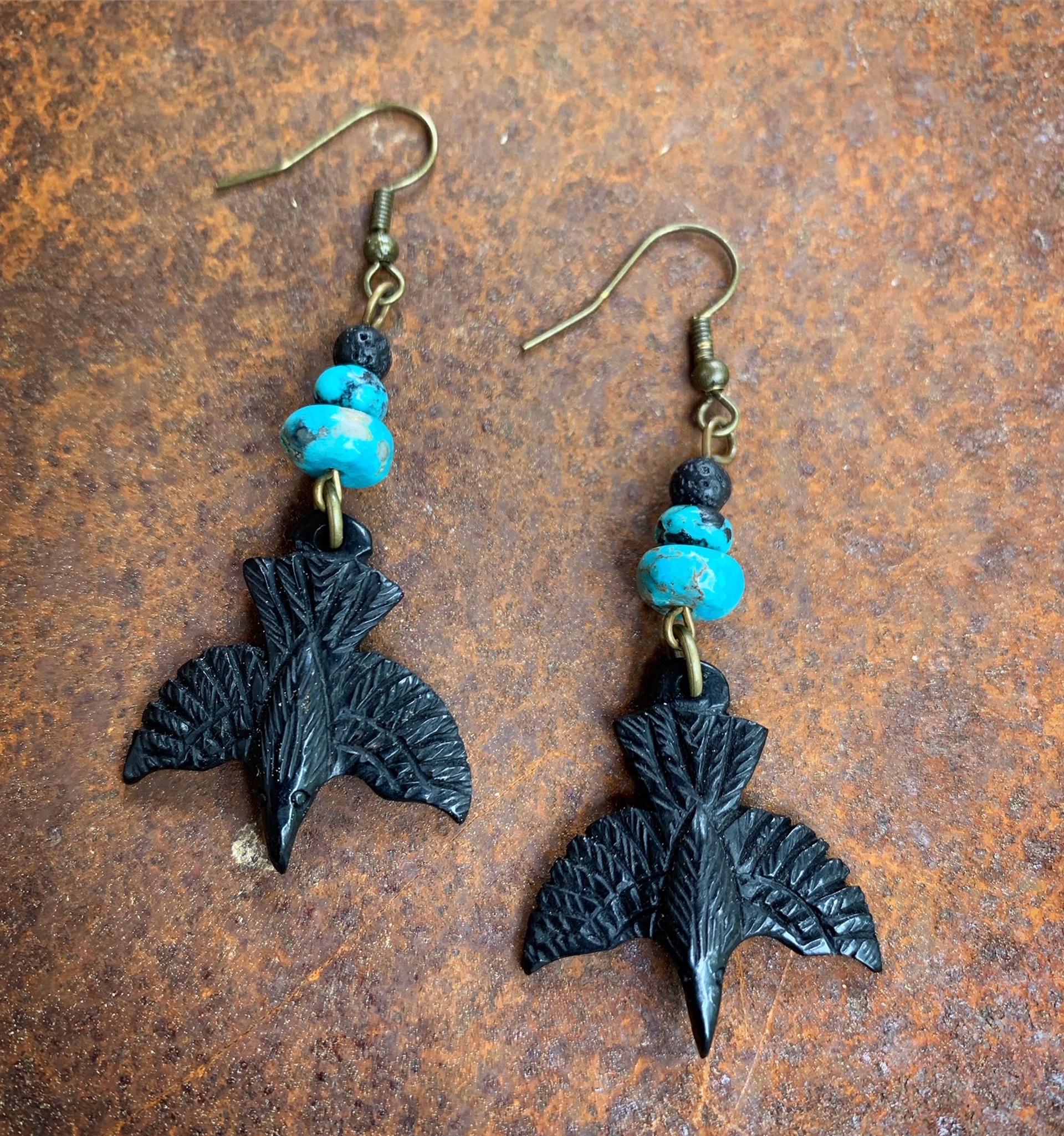 K860 Carved Buffalo Horn Raven Earrings with Turquoise by Kelly Ormsby